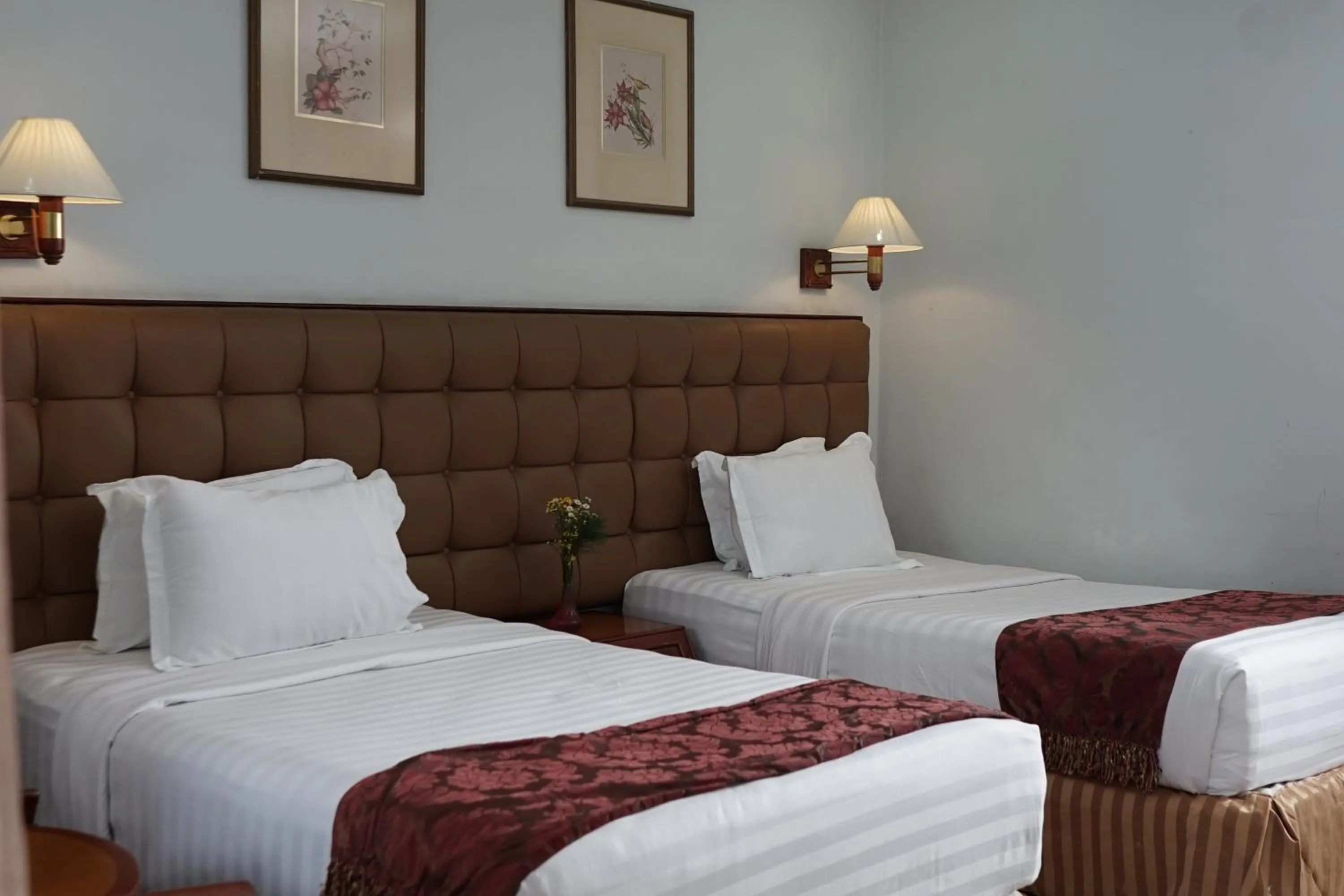 Bed in Rudang Hotel & Resort Berastagi