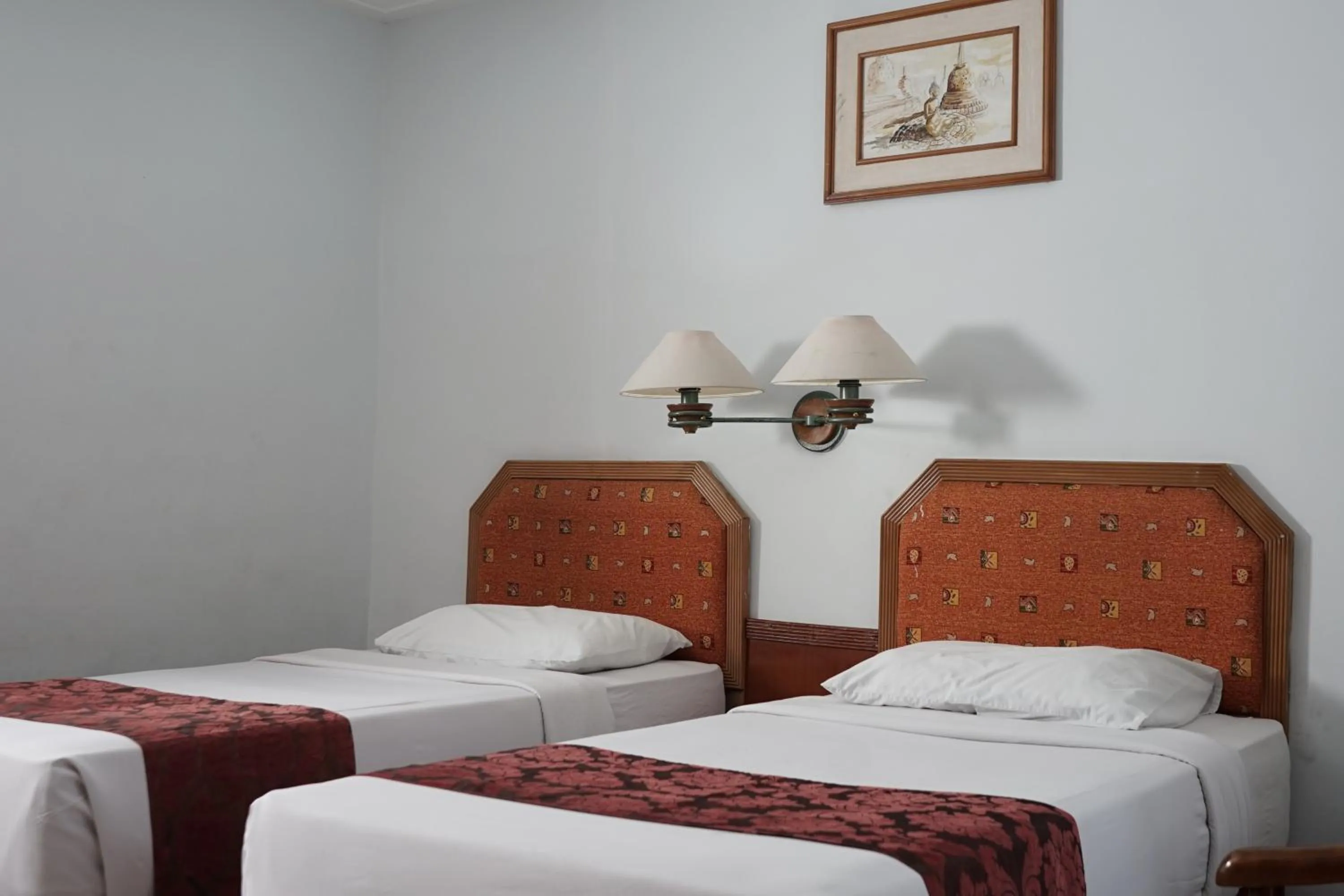 Bed in Rudang Hotel & Resort Berastagi