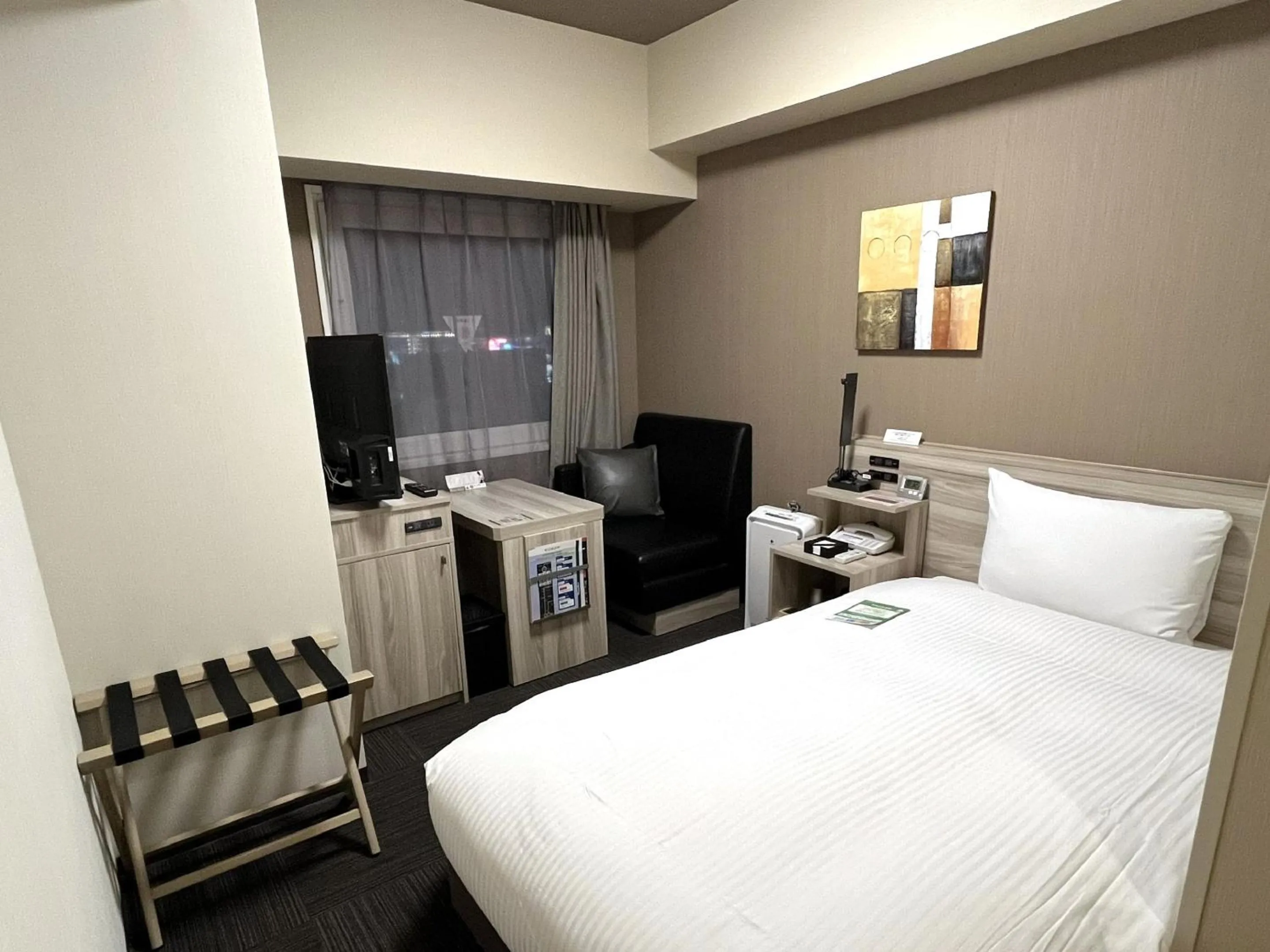 Photo of the whole room, Bed in Hotel Route Inn Takamatsu Yashima