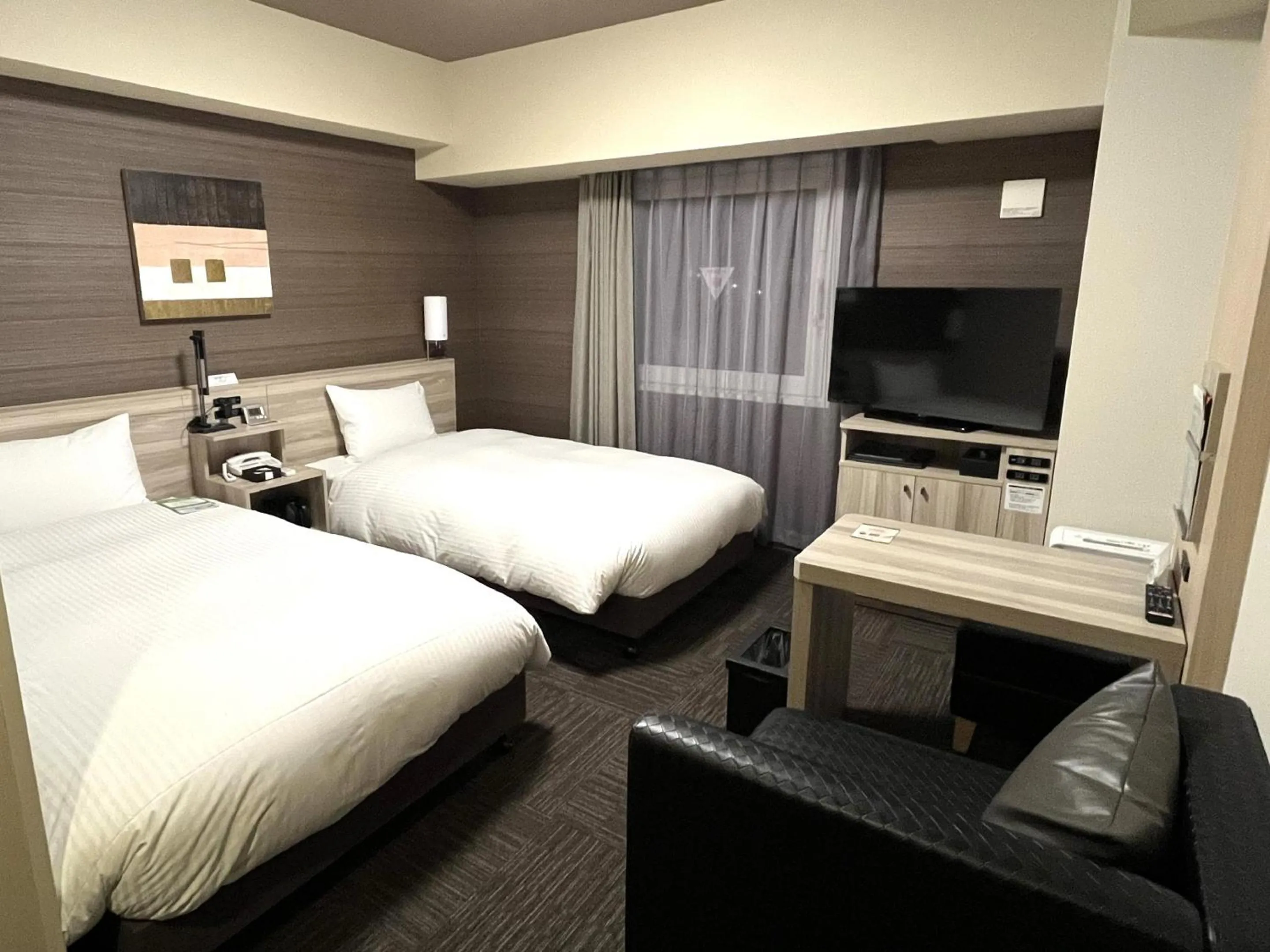 Photo of the whole room, Bed in Hotel Route Inn Takamatsu Yashima