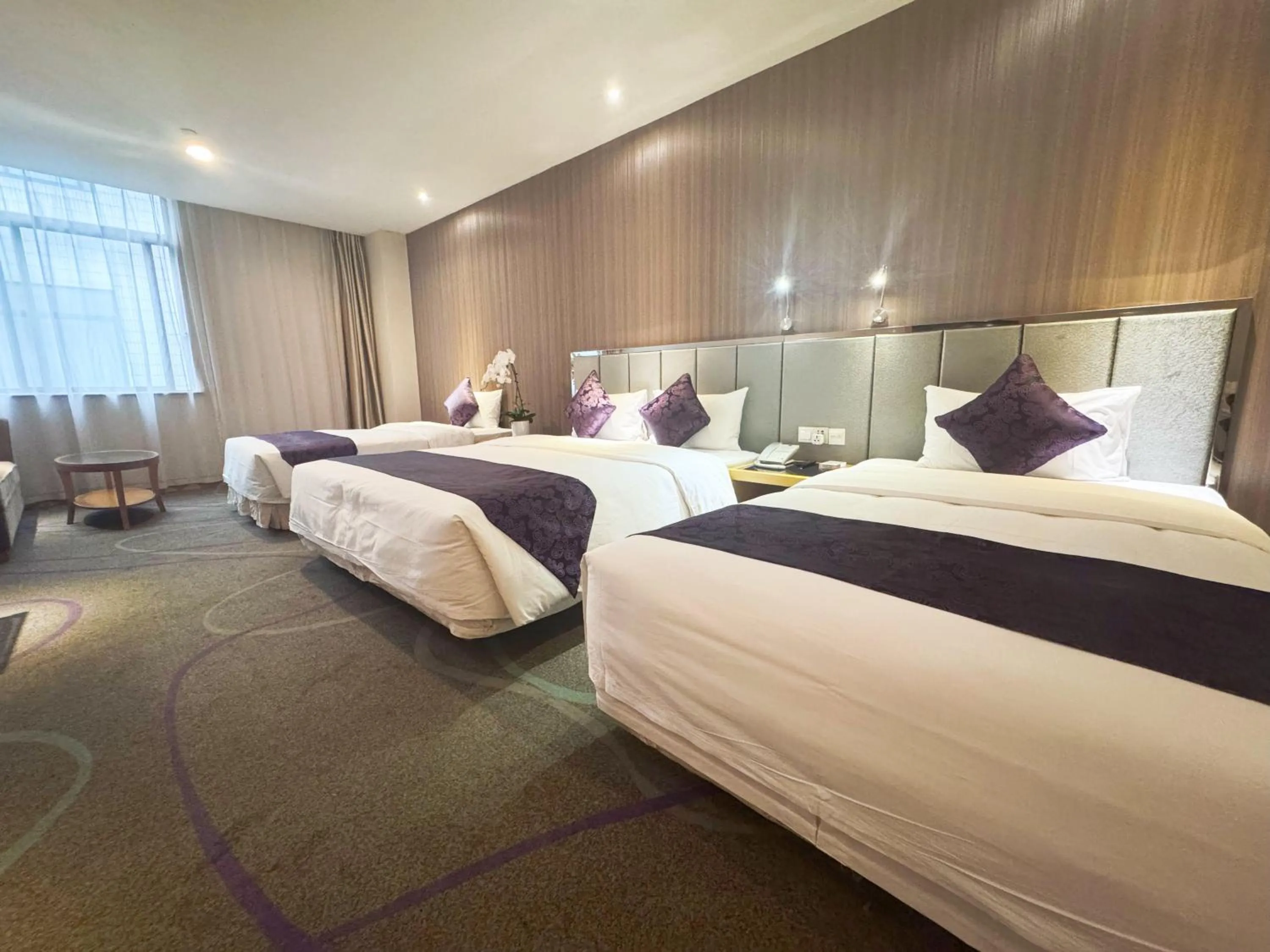 Photo of the whole room, Bed in Dorsett Wuhan