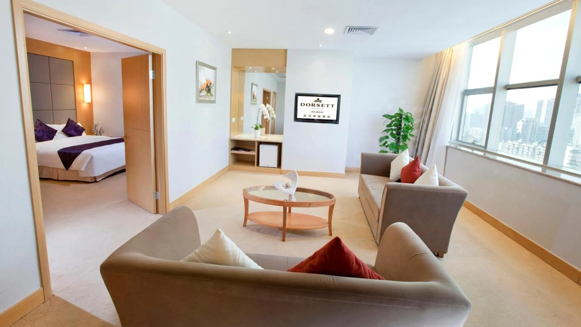 Living room, Bed in Dorsett Wuhan