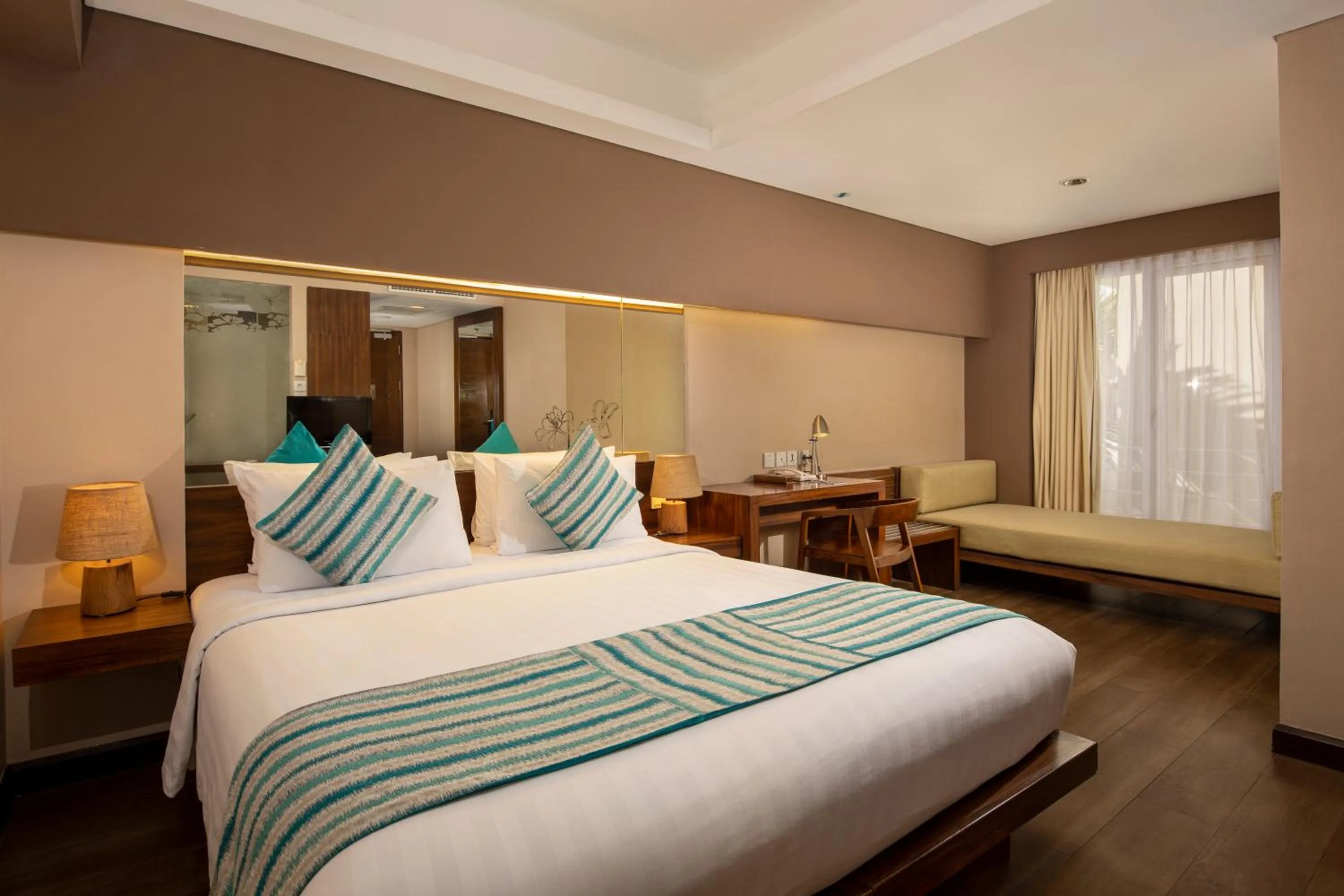 Bed in Grand Ixora Kuta Resort