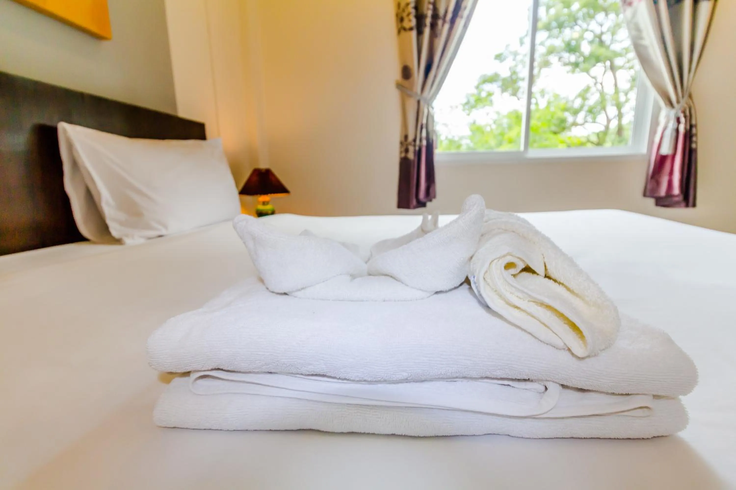 Photo of the whole room, Bed in Baan Yuyen Karon Guesthouse