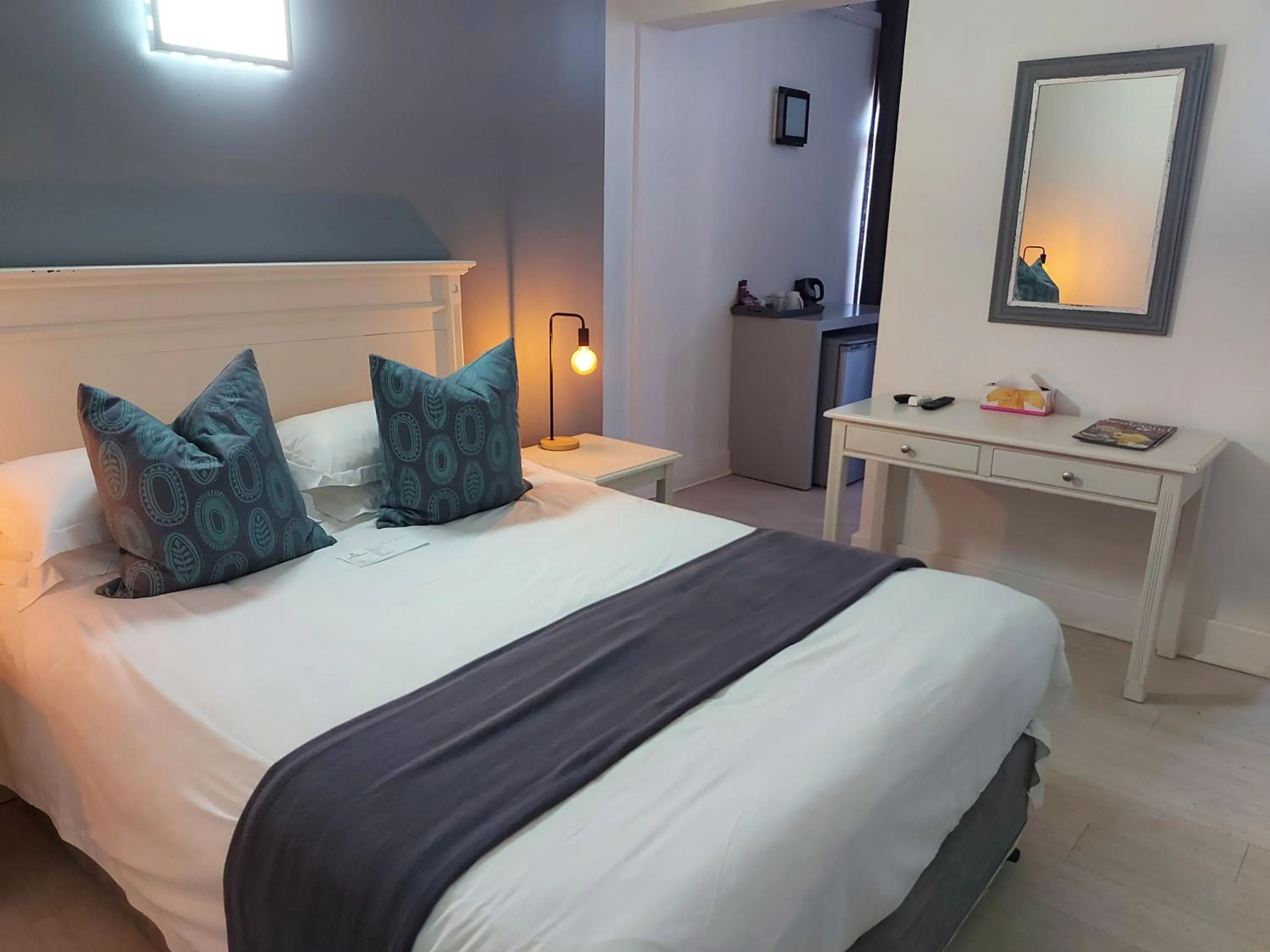 Bed in The Hampton Exclusive Guesthouse