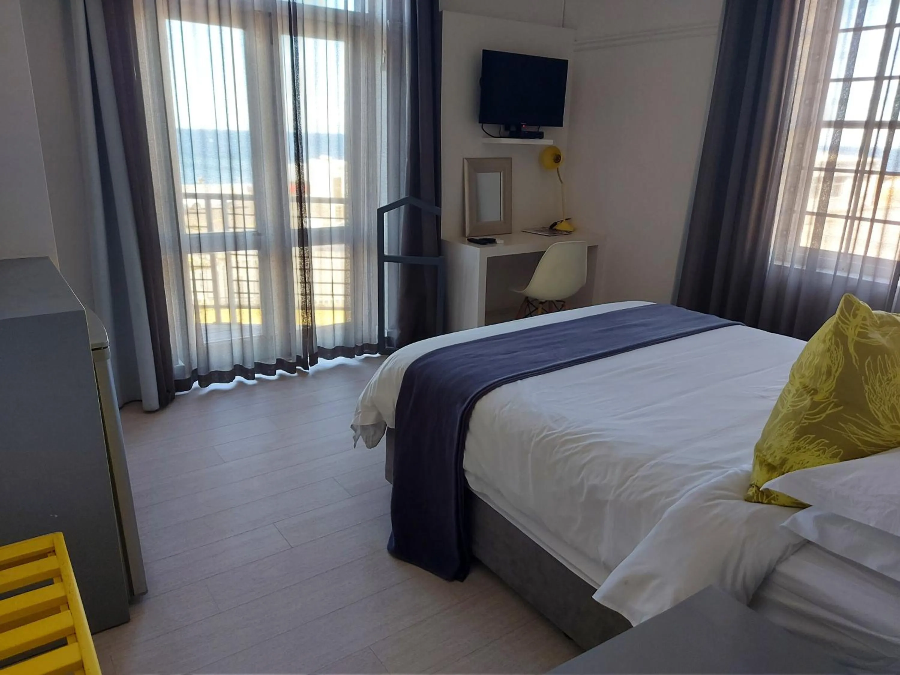 Bed in The Hampton Exclusive Guesthouse