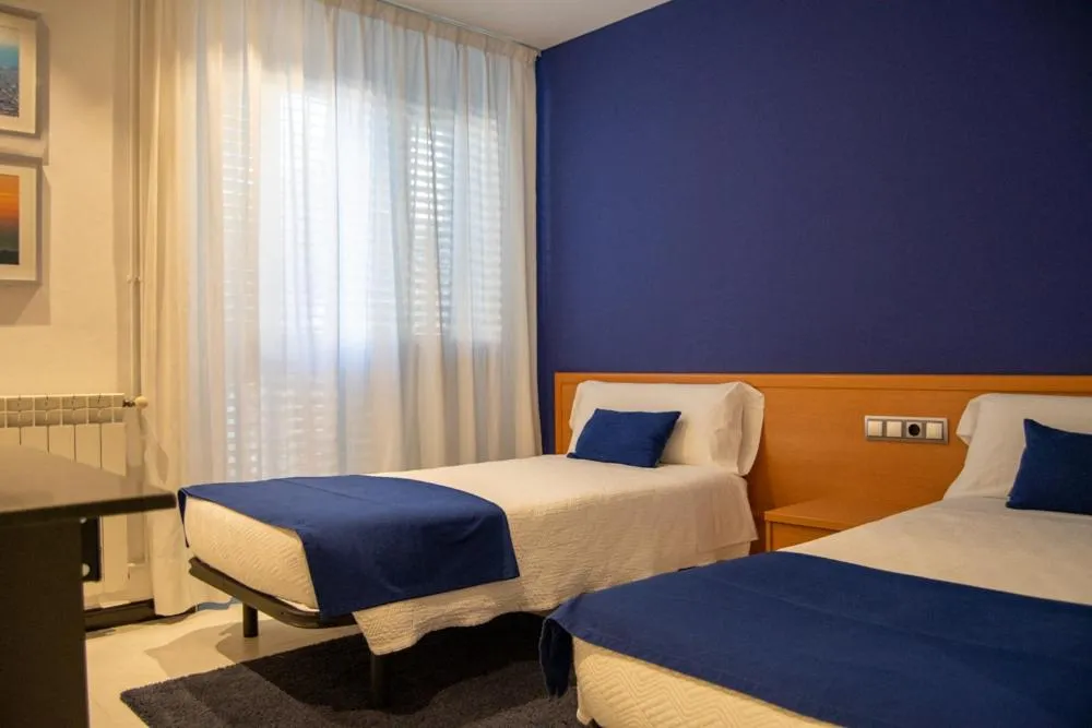 Photo of the whole room, Bed in Hostal Apolo