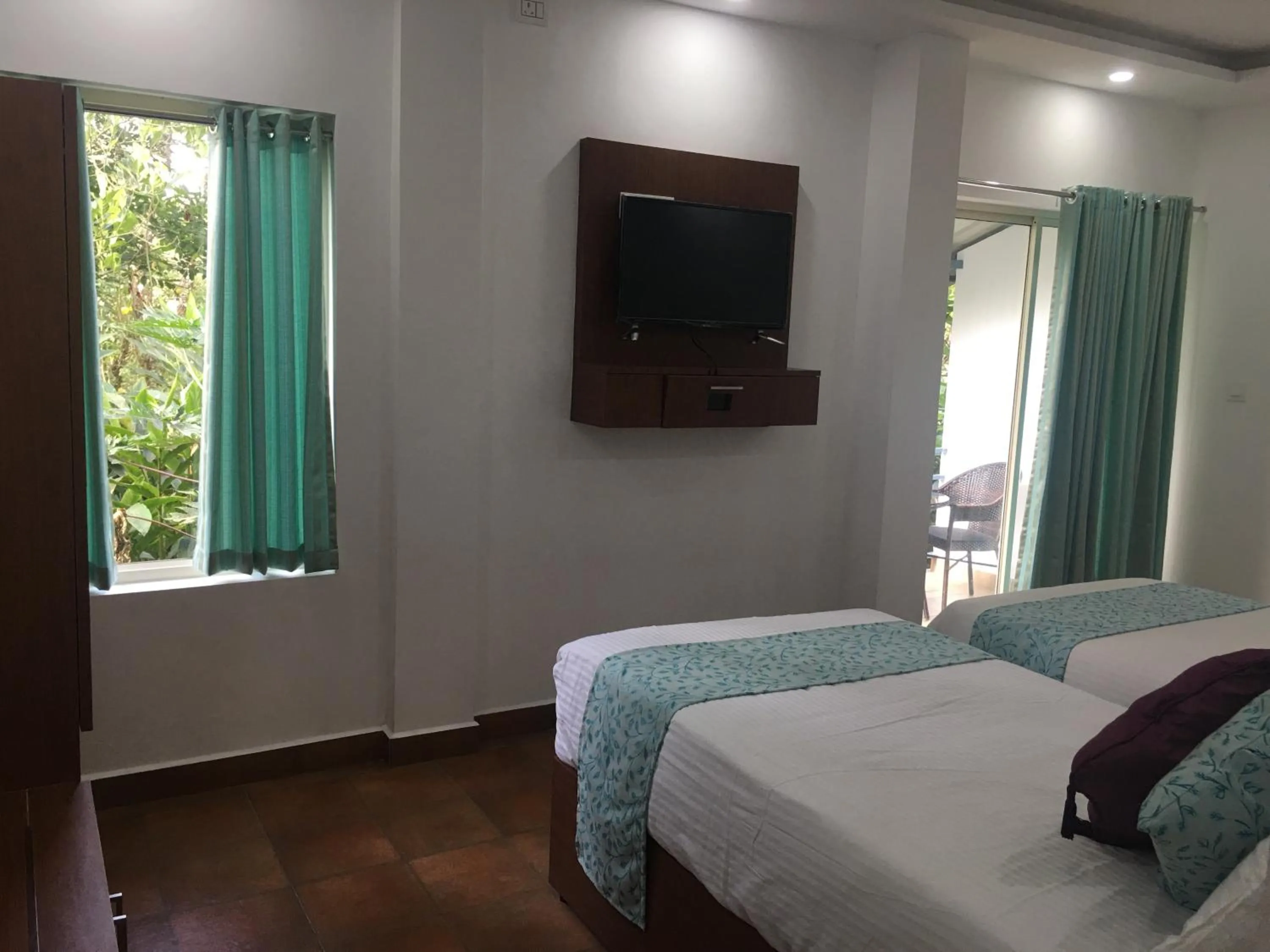 Bed in Spice Villa Thekkady