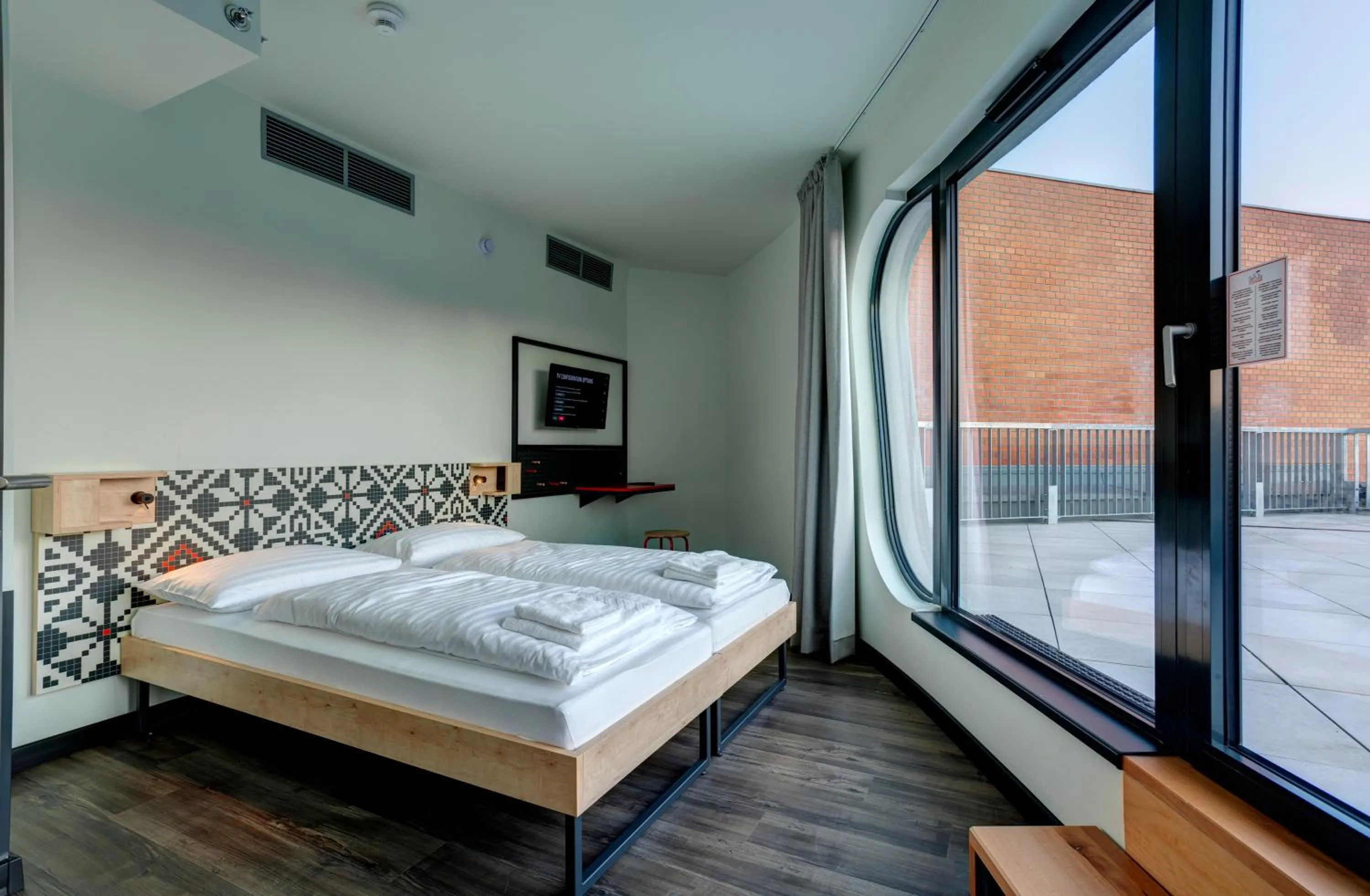 Bedroom, Bed in MEININGER Budapest Great Market Hall