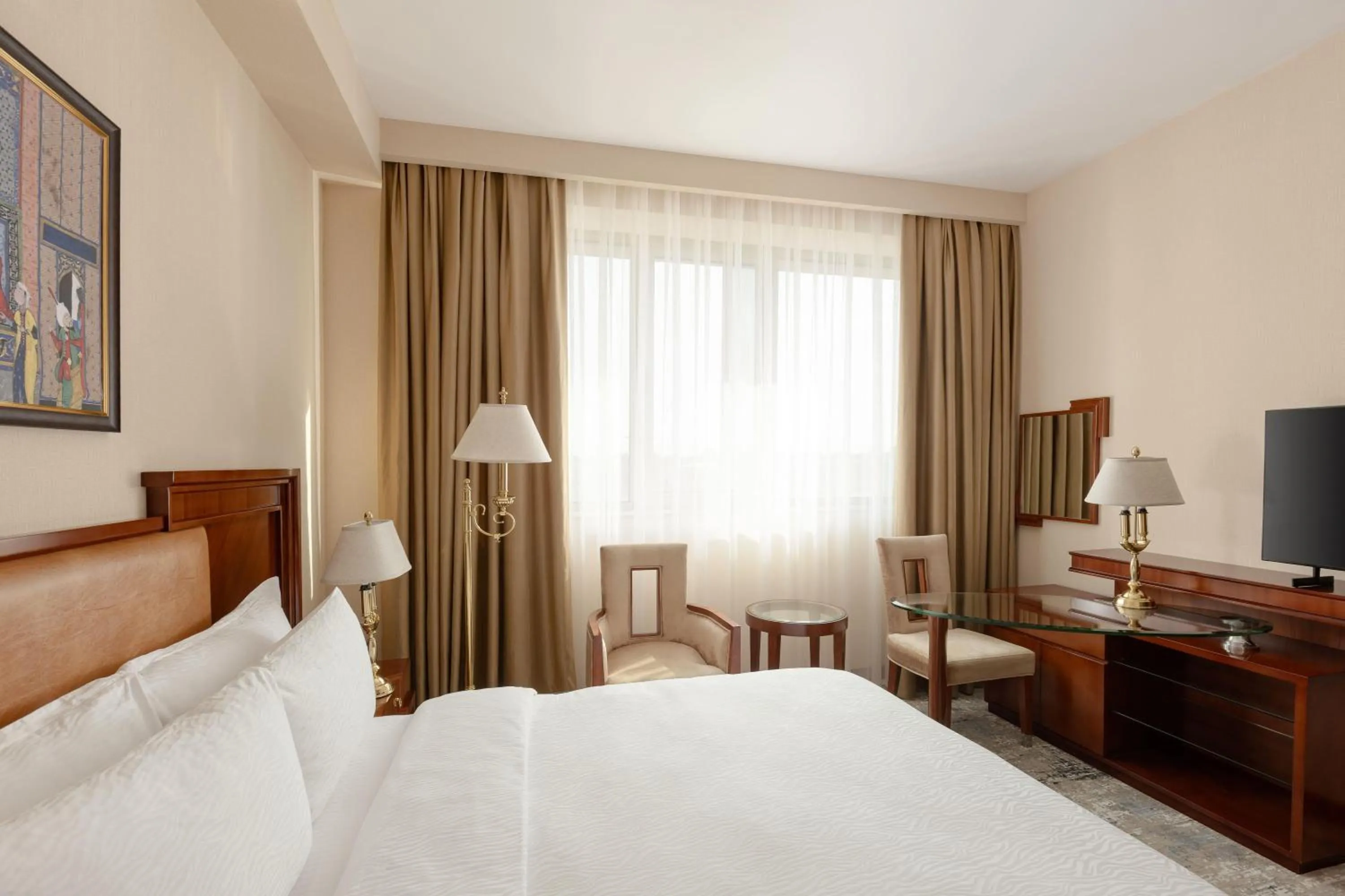 Photo of the whole room, Bed in Ramada Plaza by Wyndham Gence