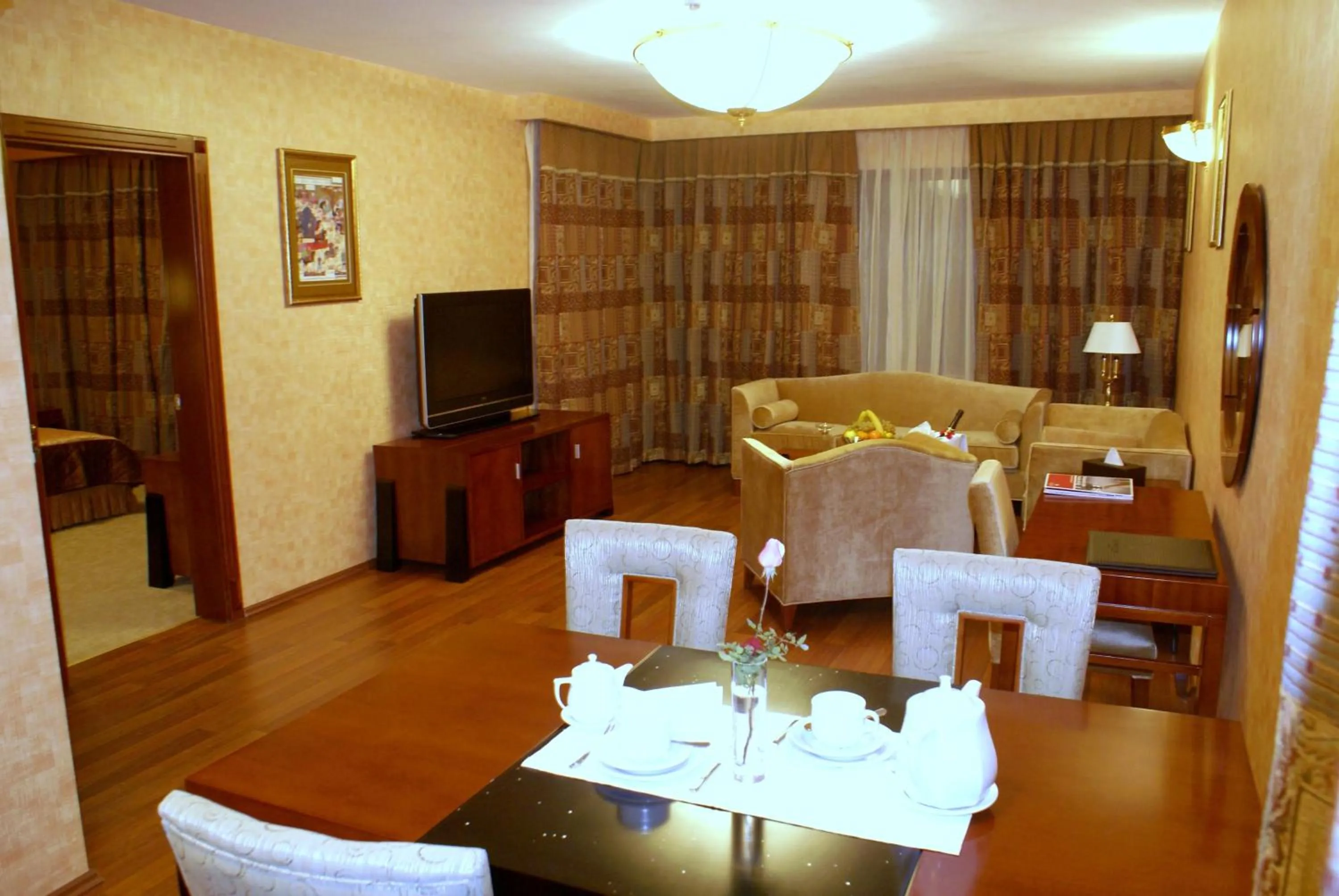 Photo of the whole room in Ramada Plaza by Wyndham Gence