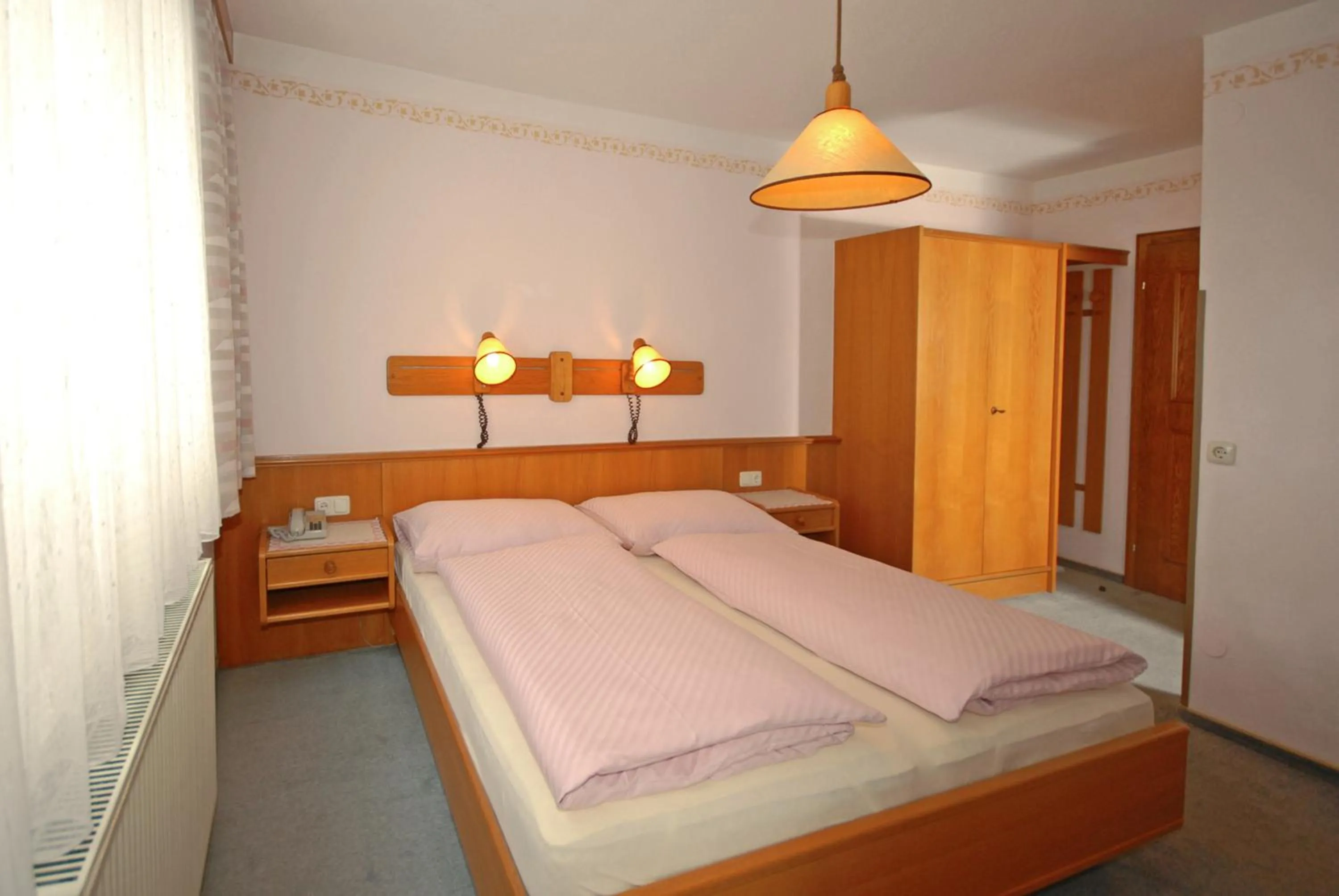 Photo of the whole room, Bed in Pension Riedlsperger