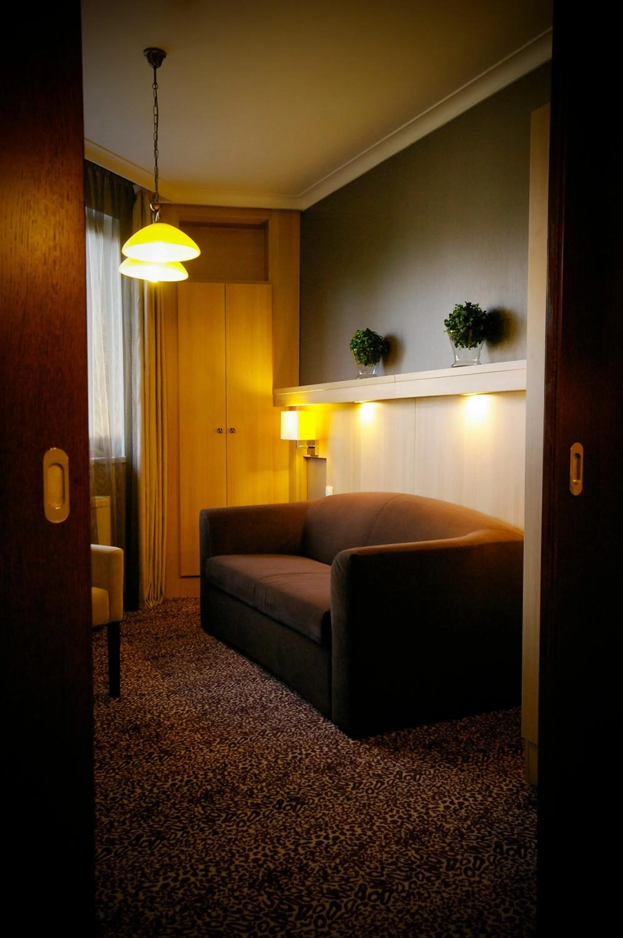 Bed in Xavin Wellness Hotel & Restaurant