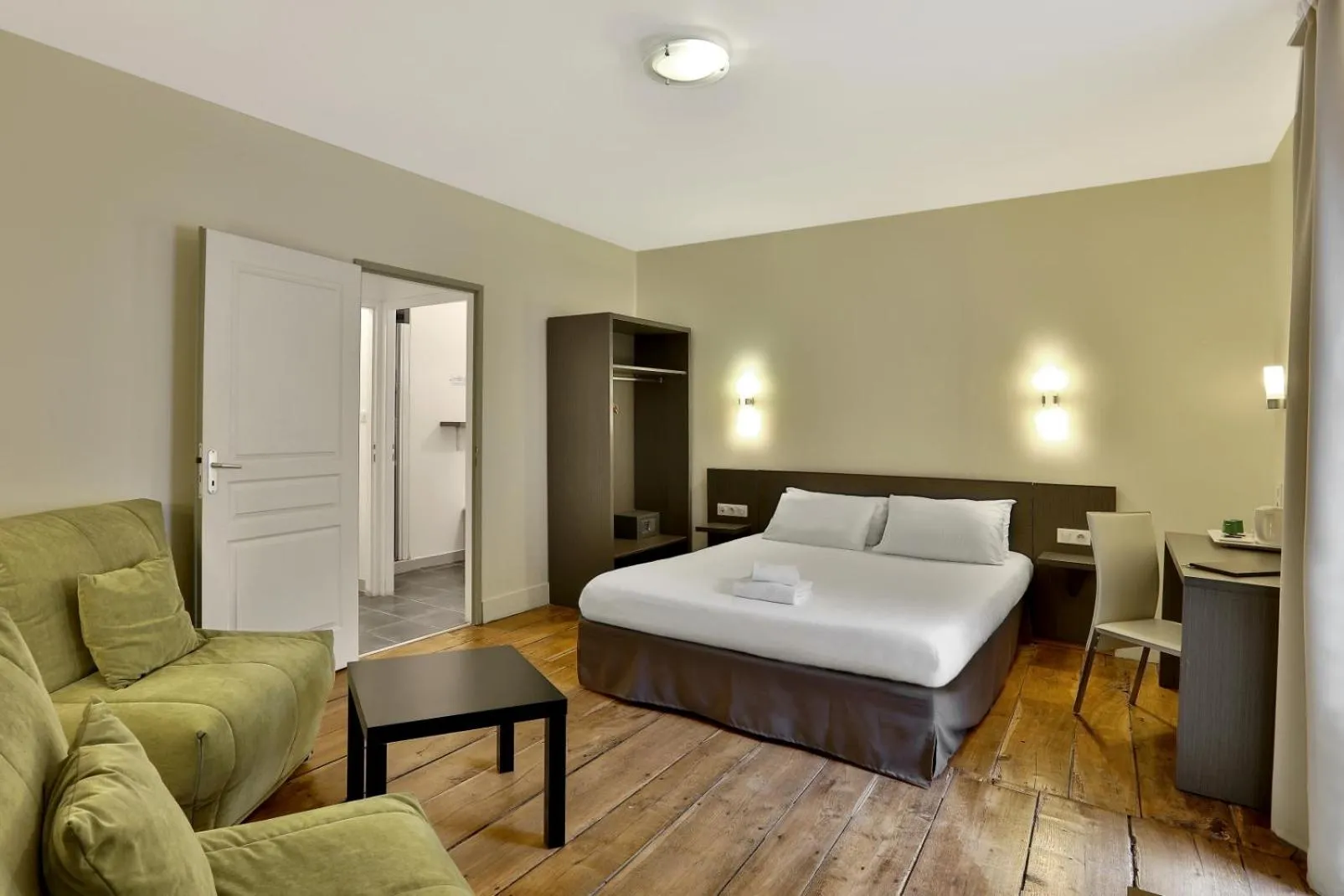 Bed in Logis Hotel Auberge Dupuytren