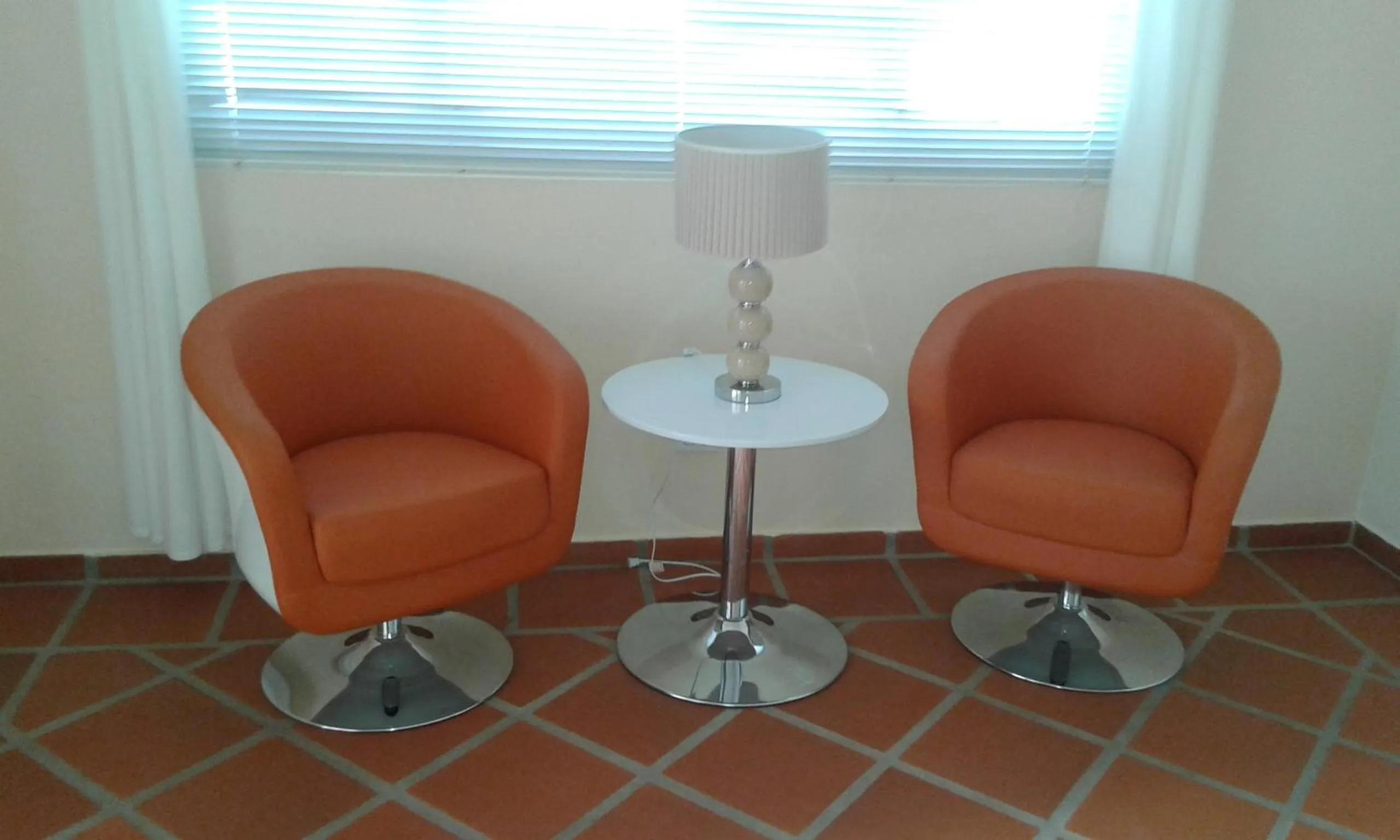 Seating area in Karibu Aruba Boutique Hotel