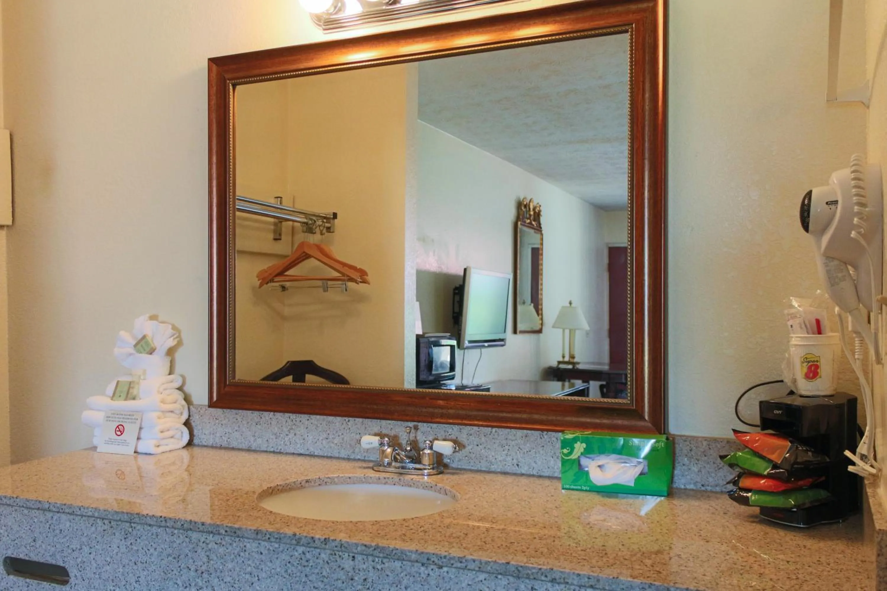 Bathroom in Super 8 by Wyndham College Park/Atlanta Airport West