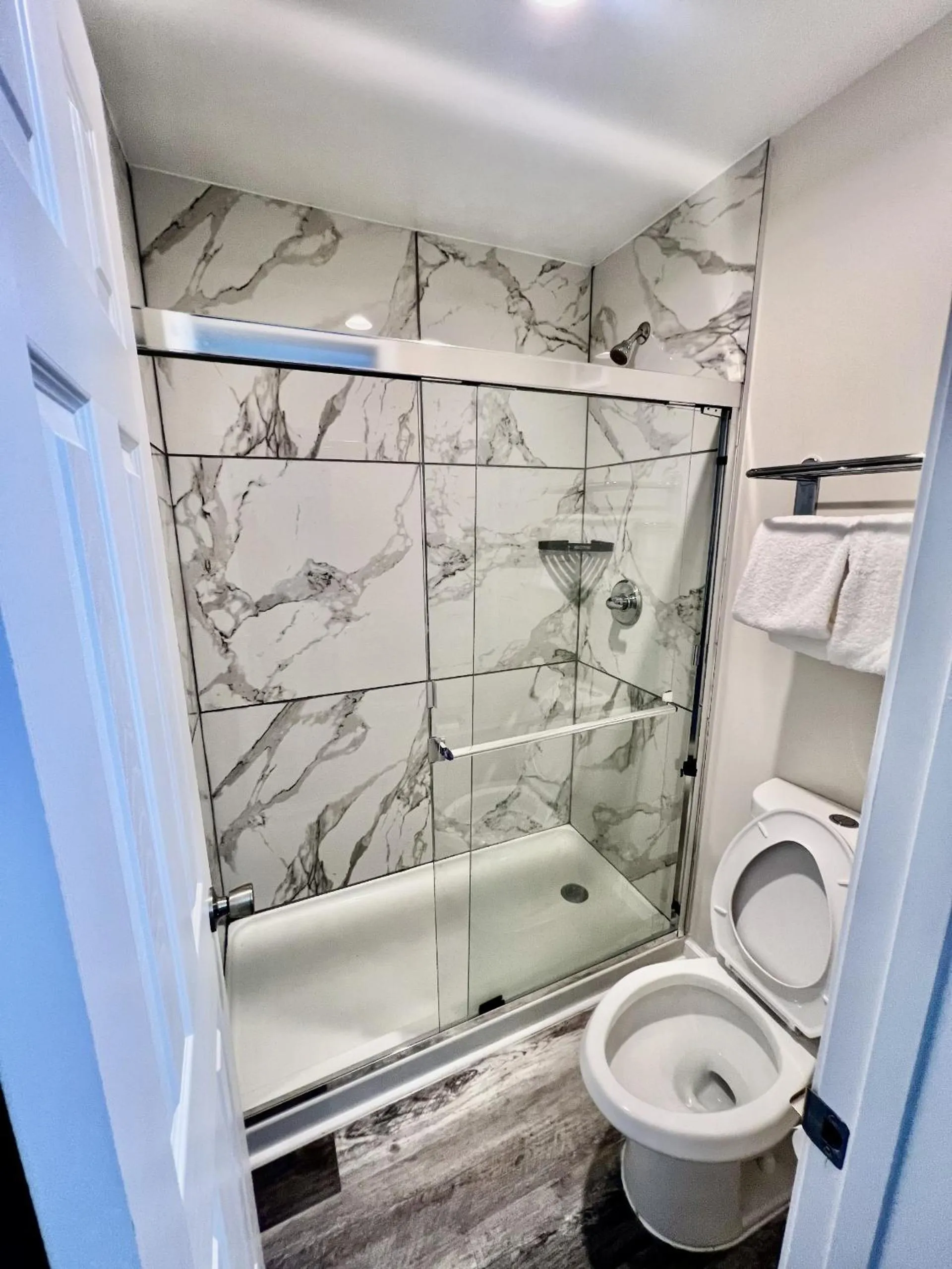 Bathroom in Super 8 by Wyndham College Park/Atlanta Airport West