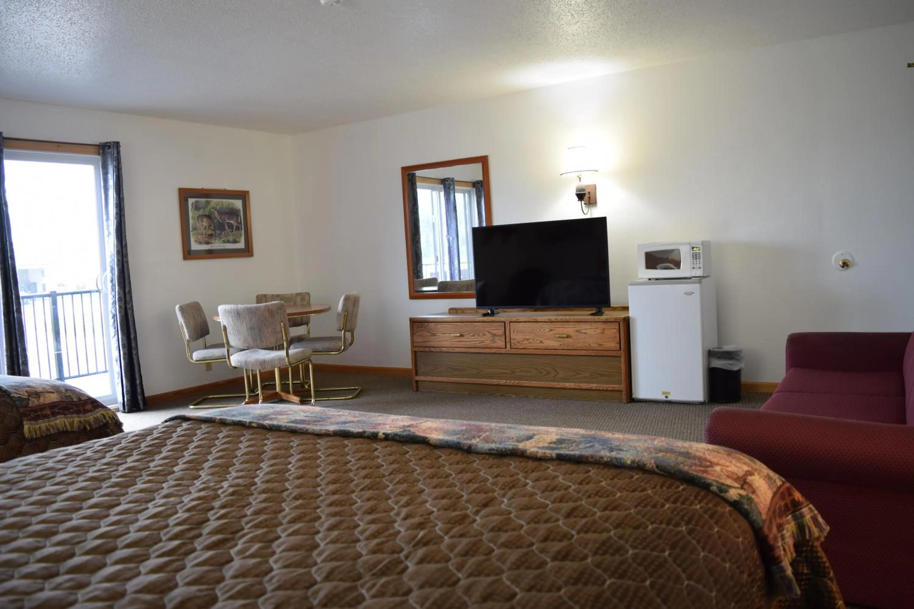 Communal lounge/ TV room in The Otter Lodge