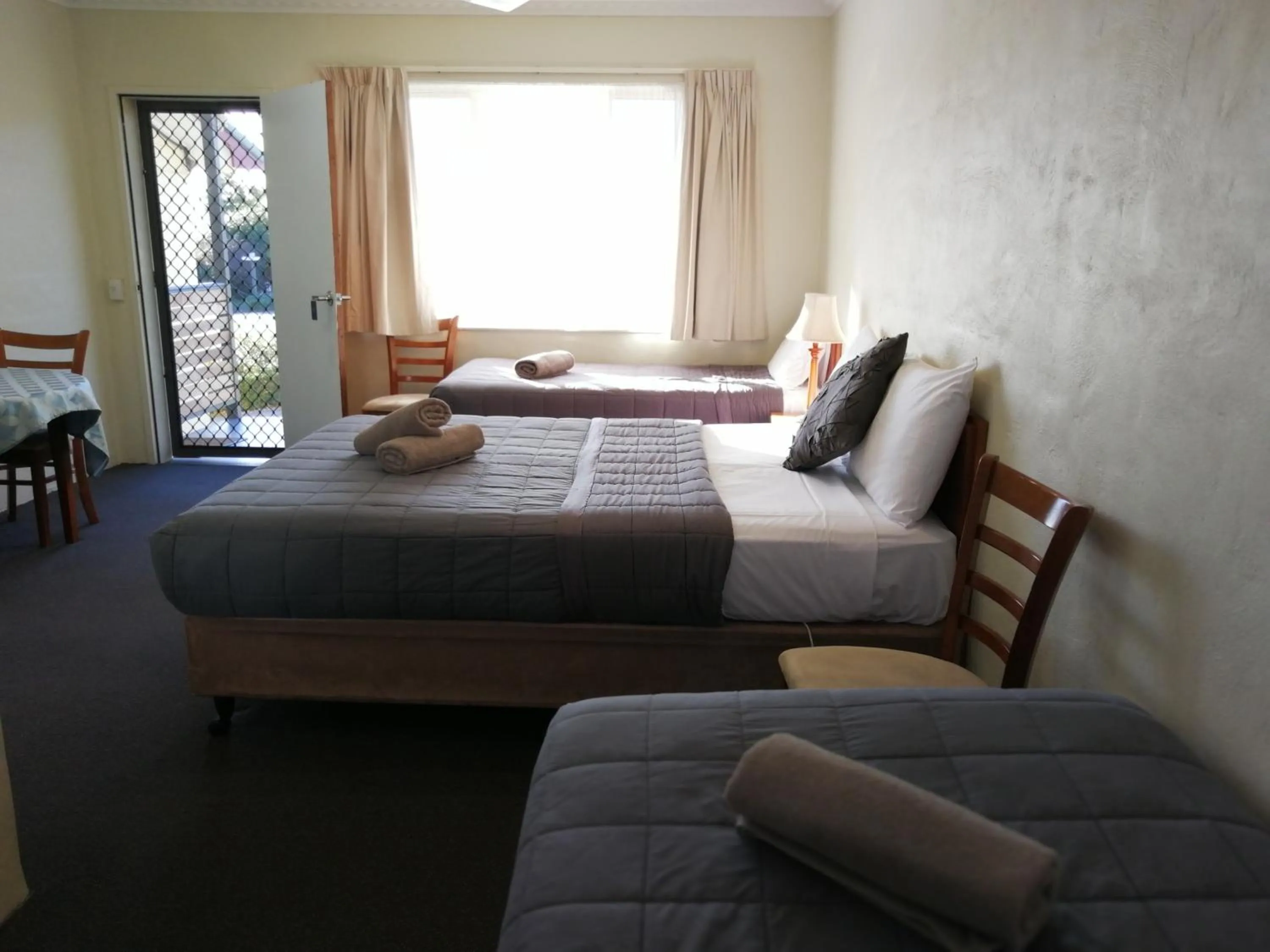 Bed in Wintersun Gardens Motel