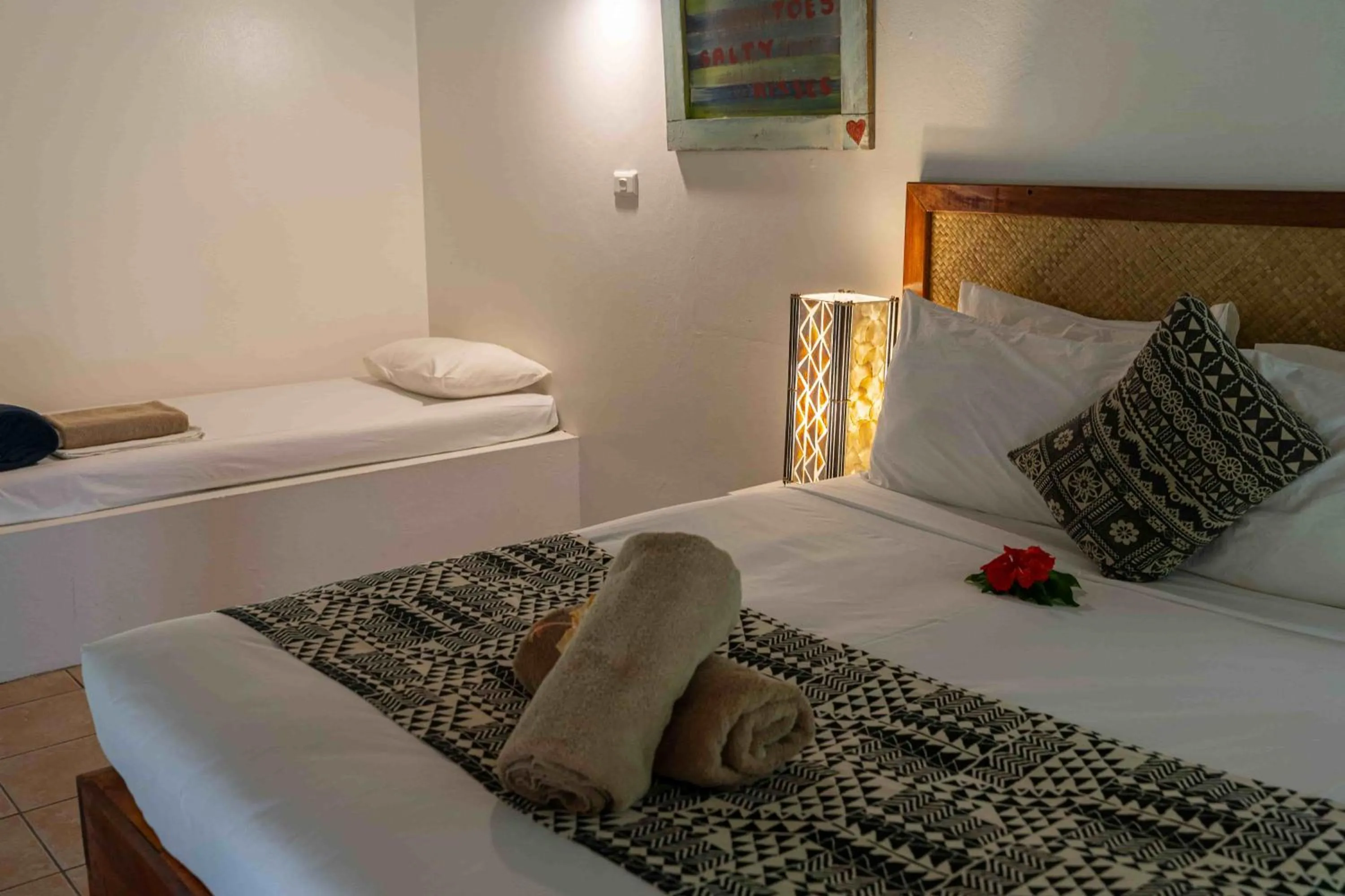 Bed in Beachouse Resort