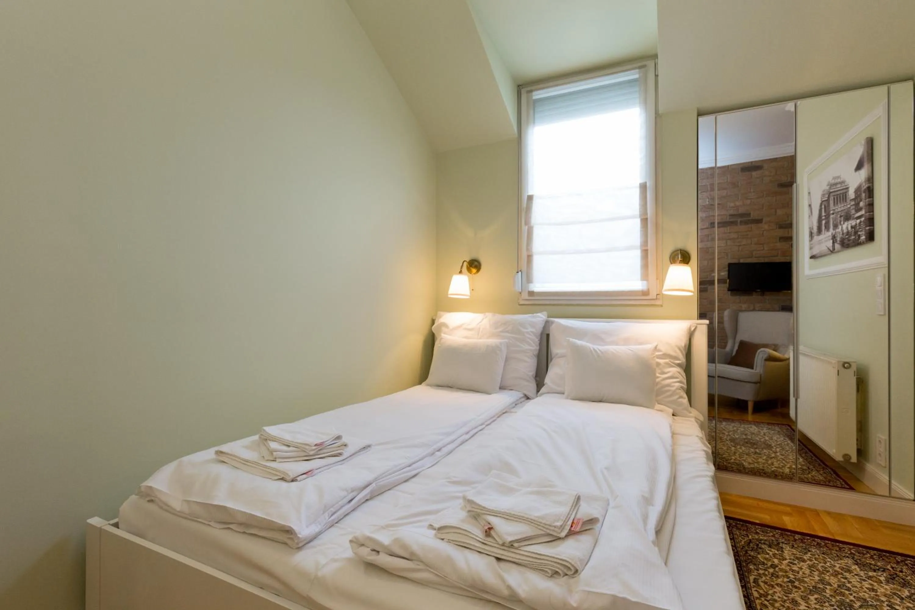 Bed in Roland Apartments