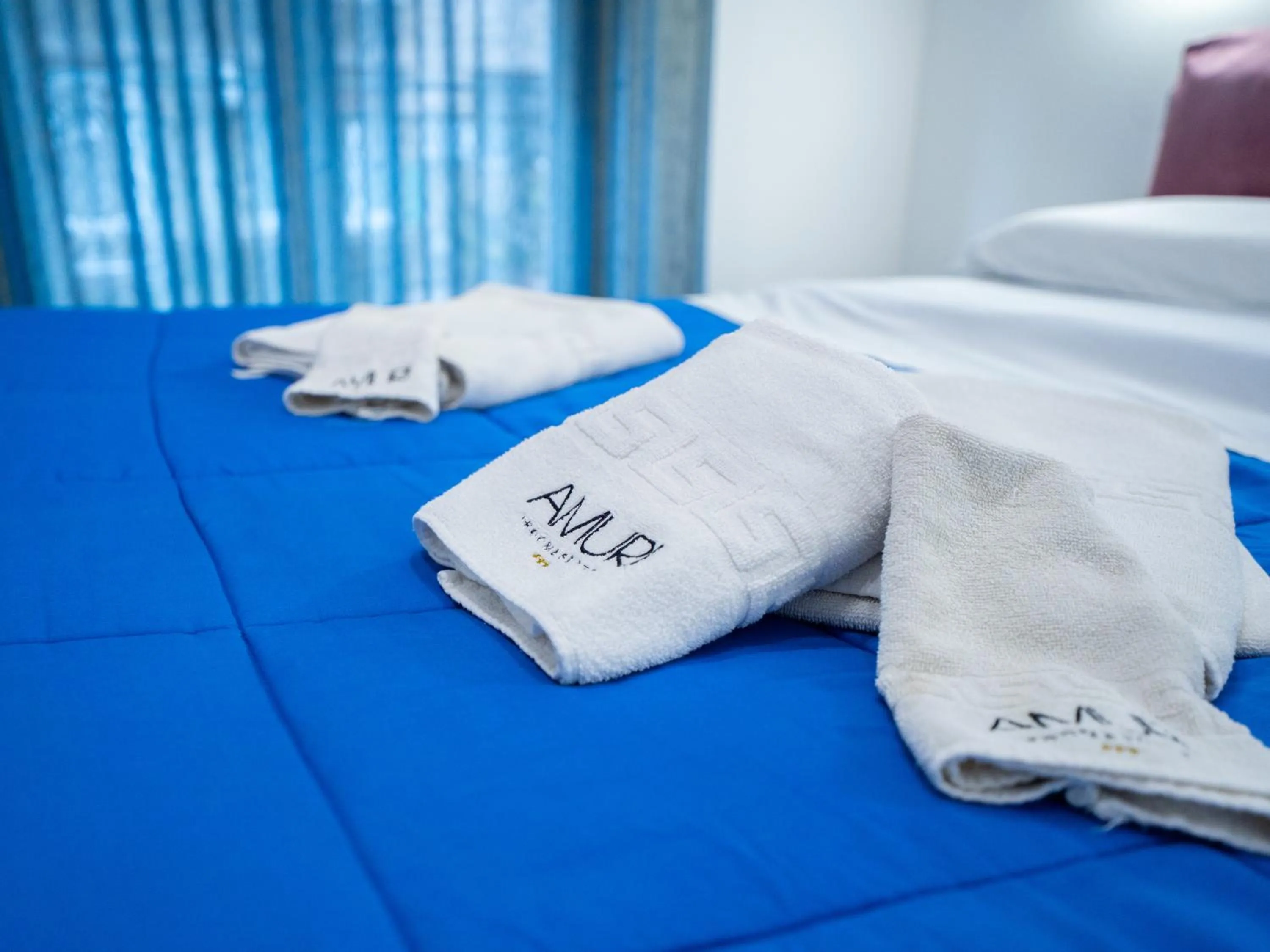 Bed in Amuri Room&Suite