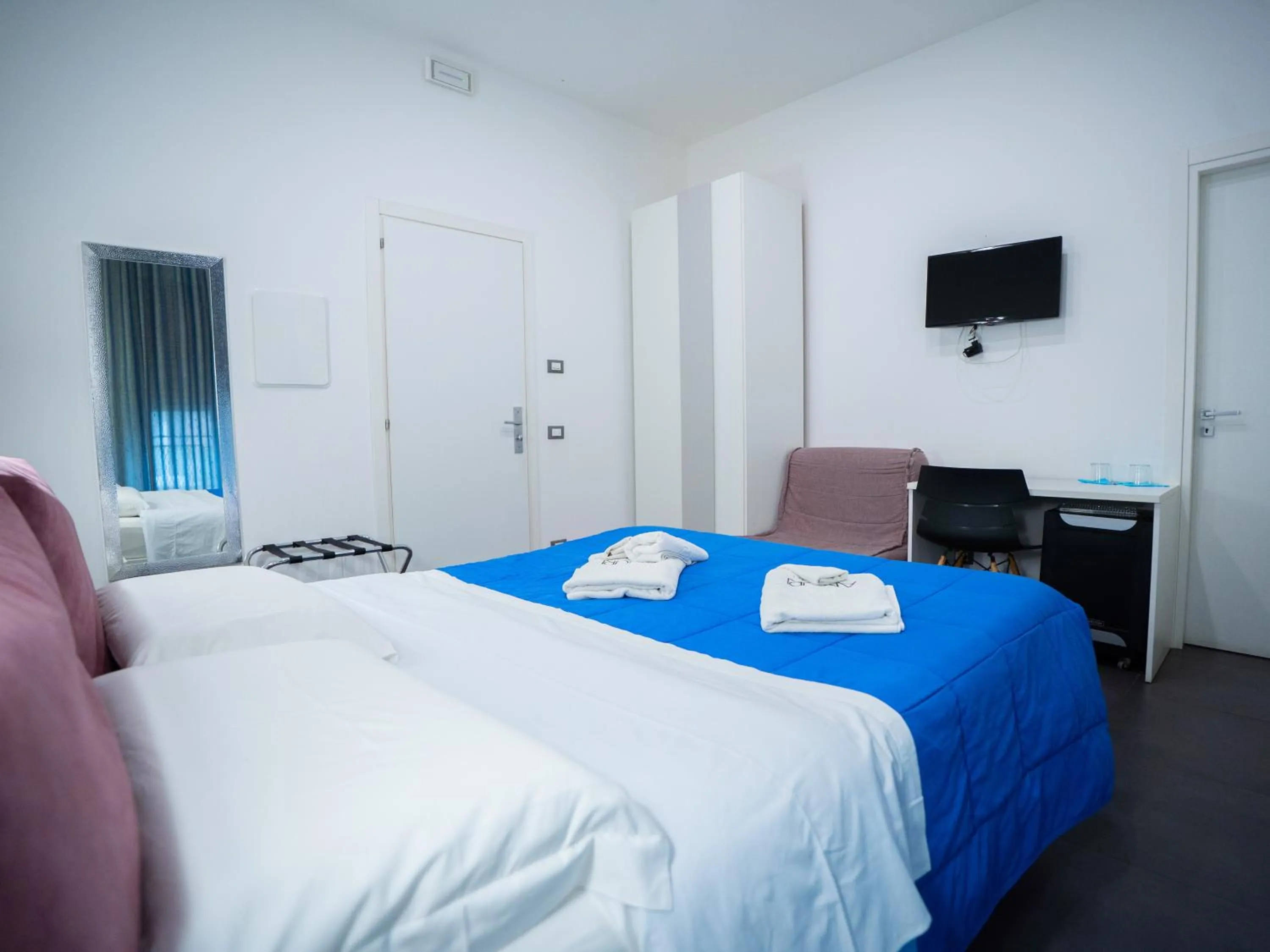 Bed in Amuri Room&Suite