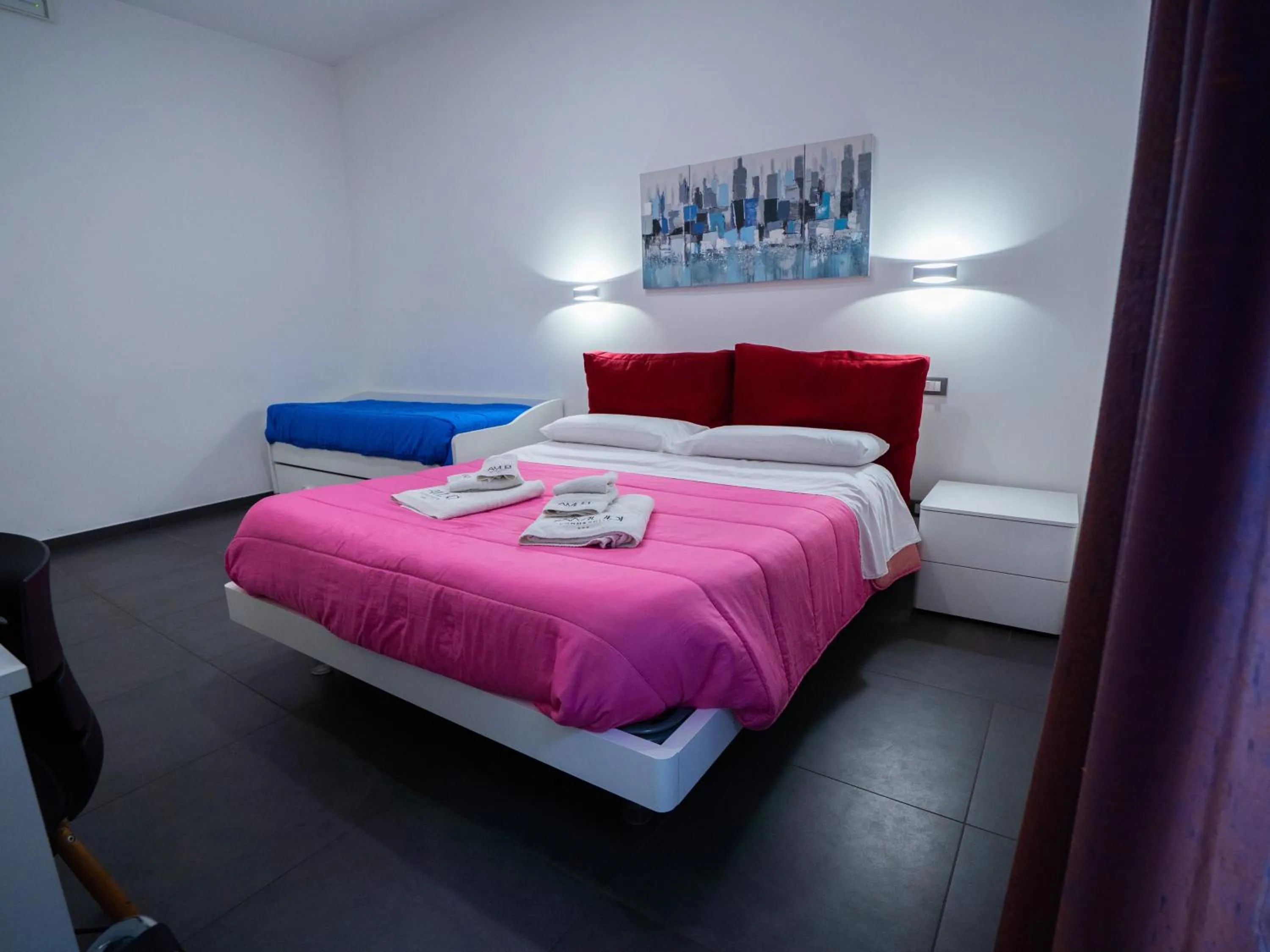 Bed in Amuri Room&Suite