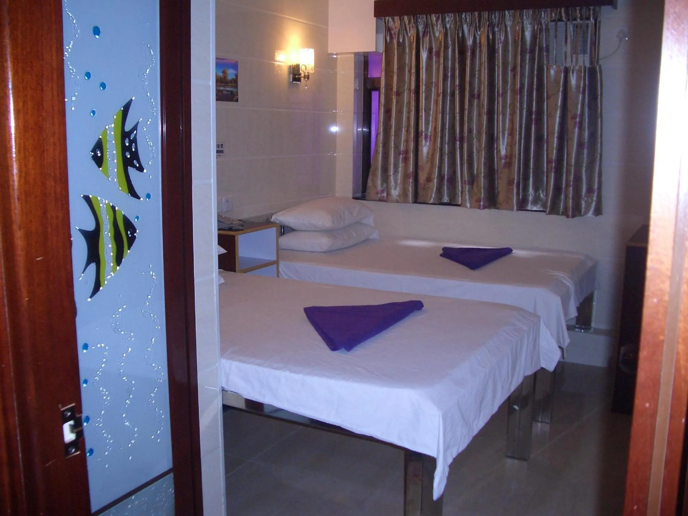 Bed in Maple Leaf Guest House