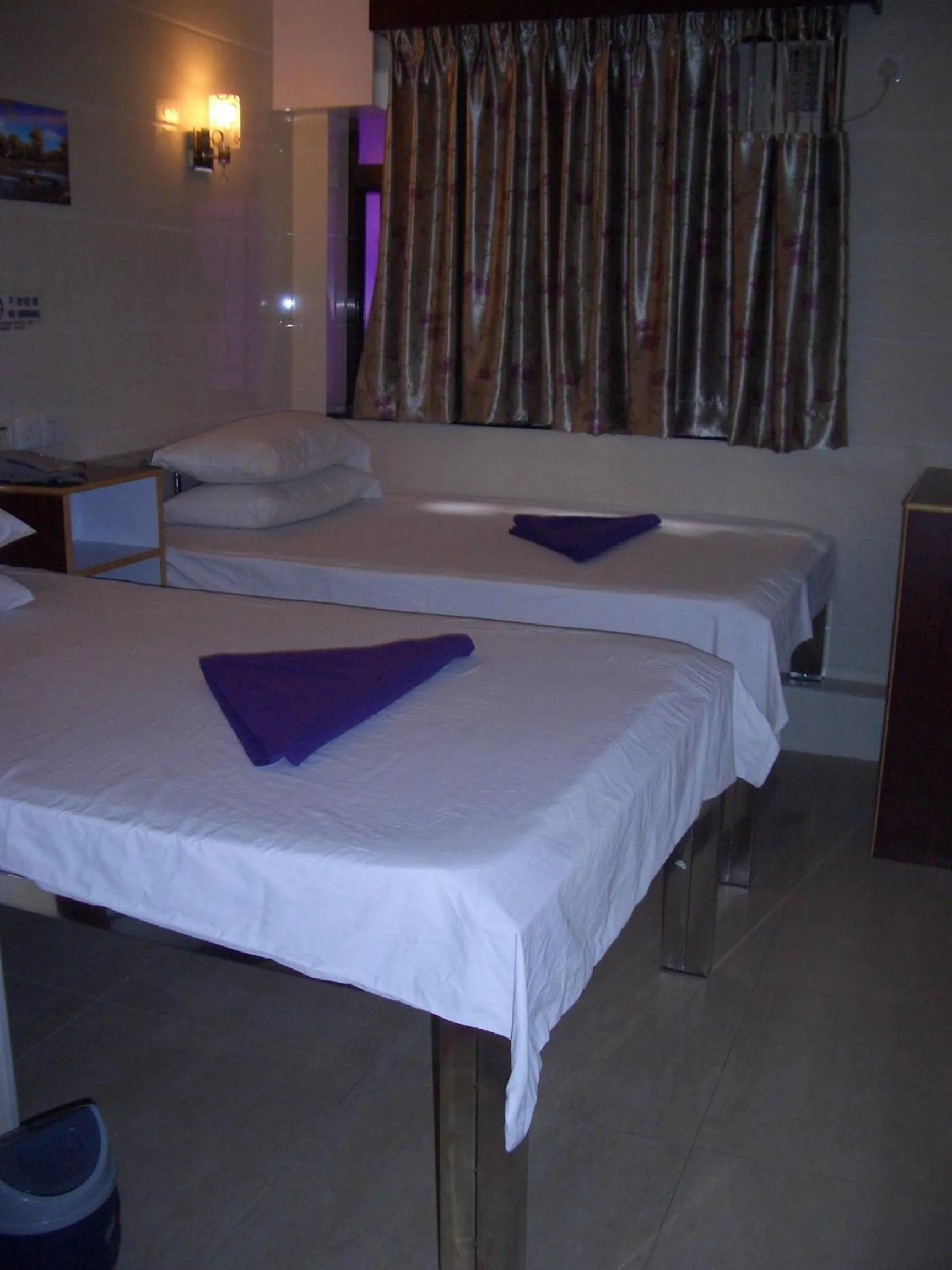 Bed in Maple Leaf Guest House