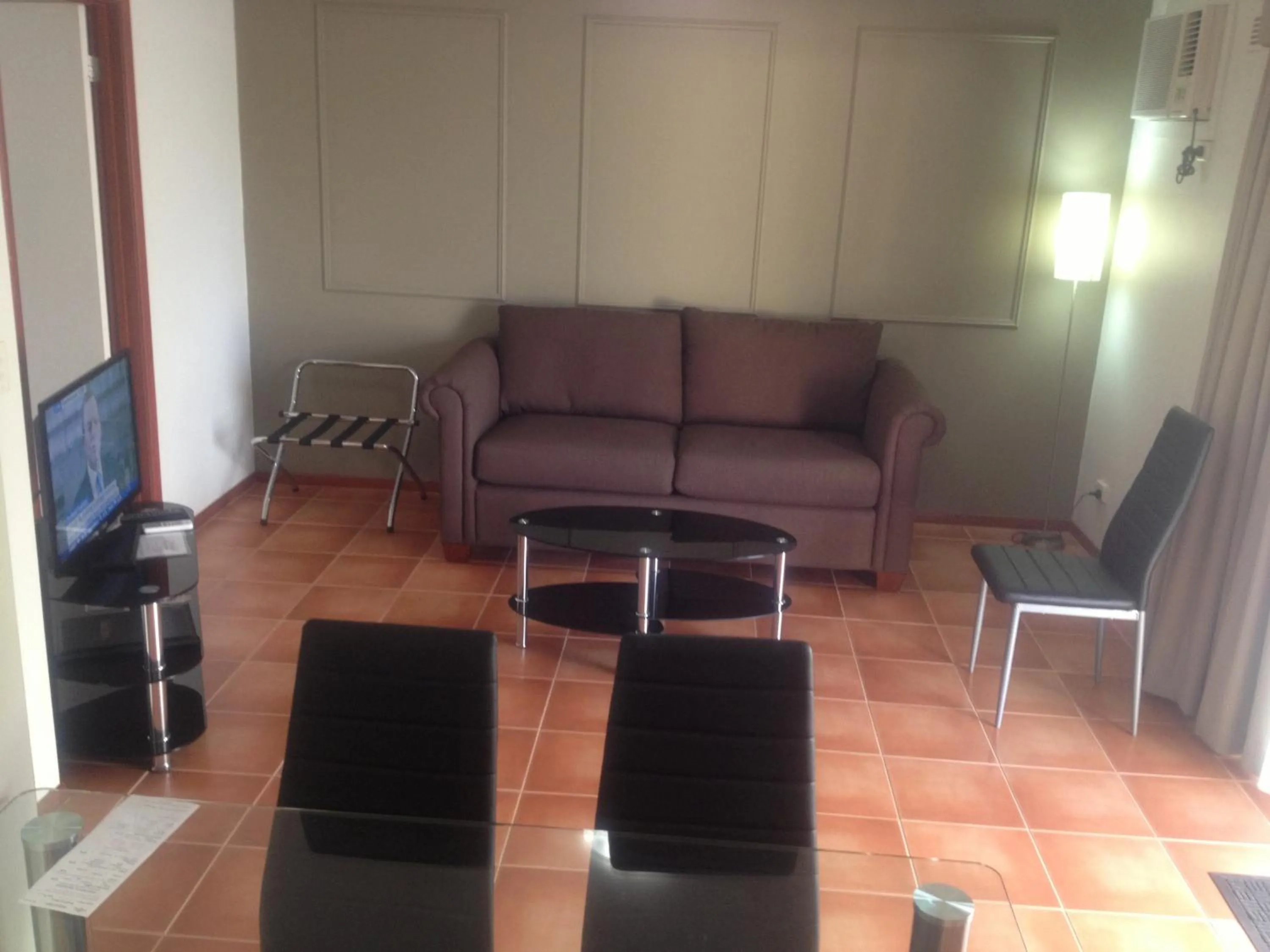 Living room in Redwood Manor Motel Apartments