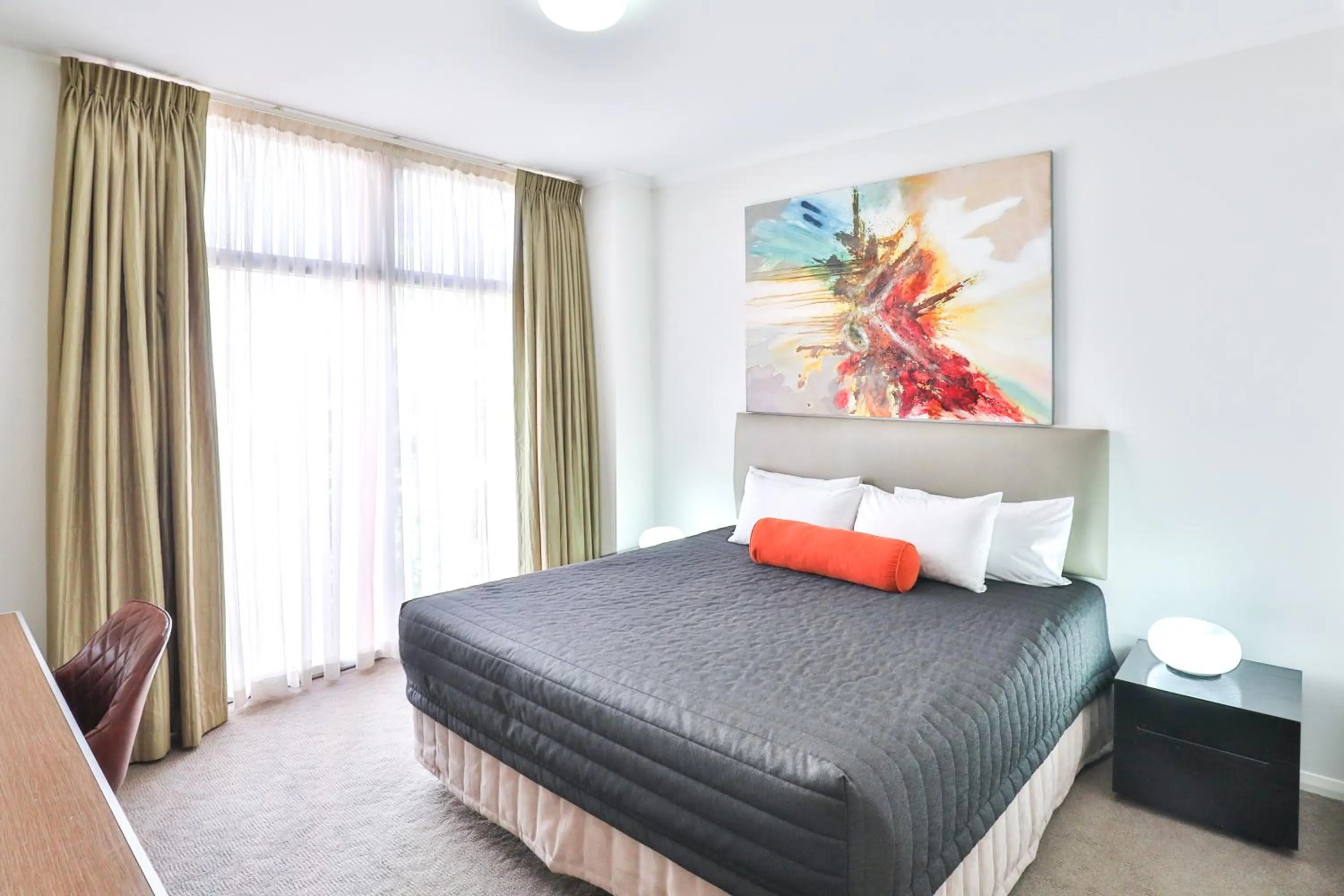 Bedroom, Bed in Indulge Apartments - Ontario