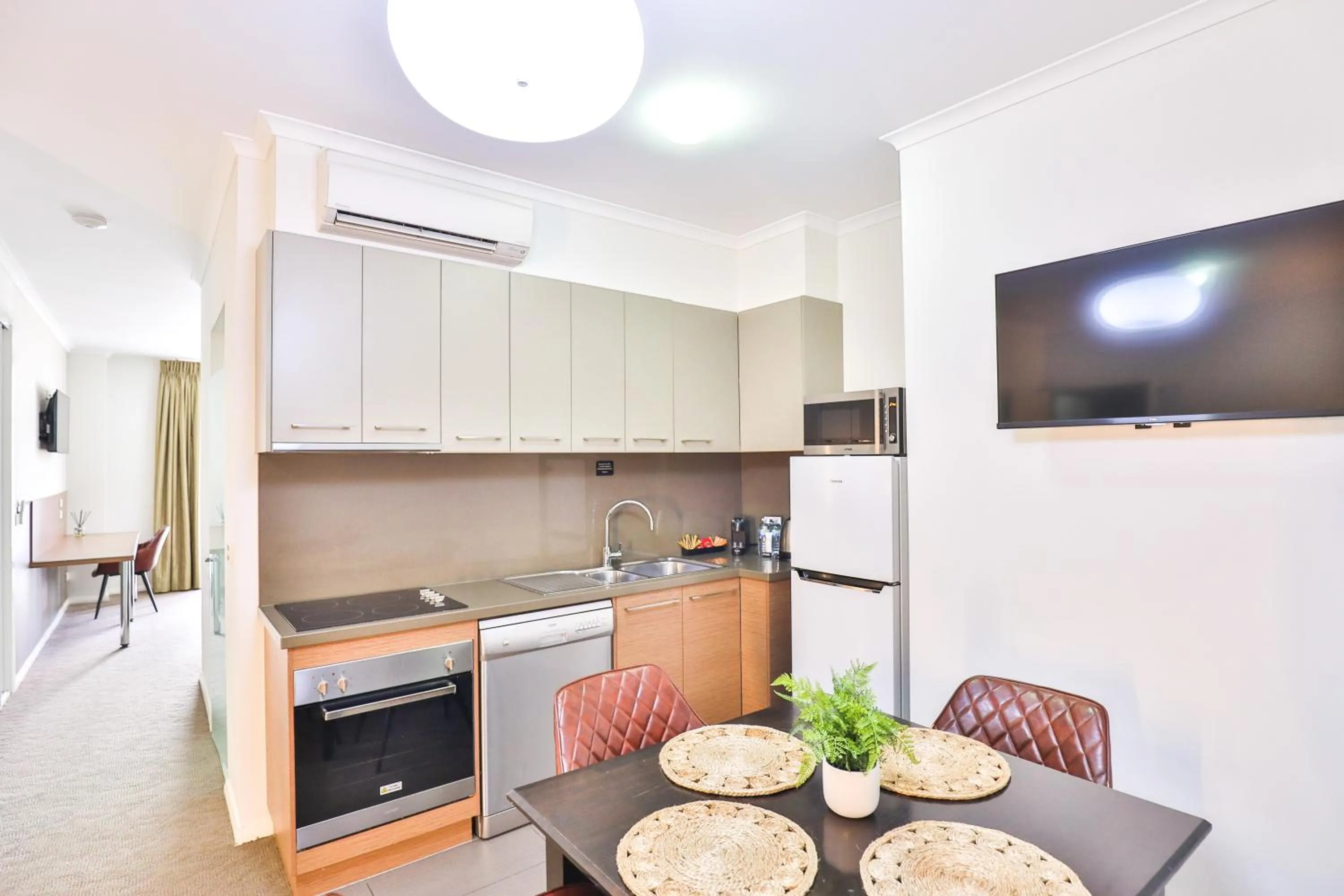 Kitchen or kitchenette in Indulge Apartments - Ontario