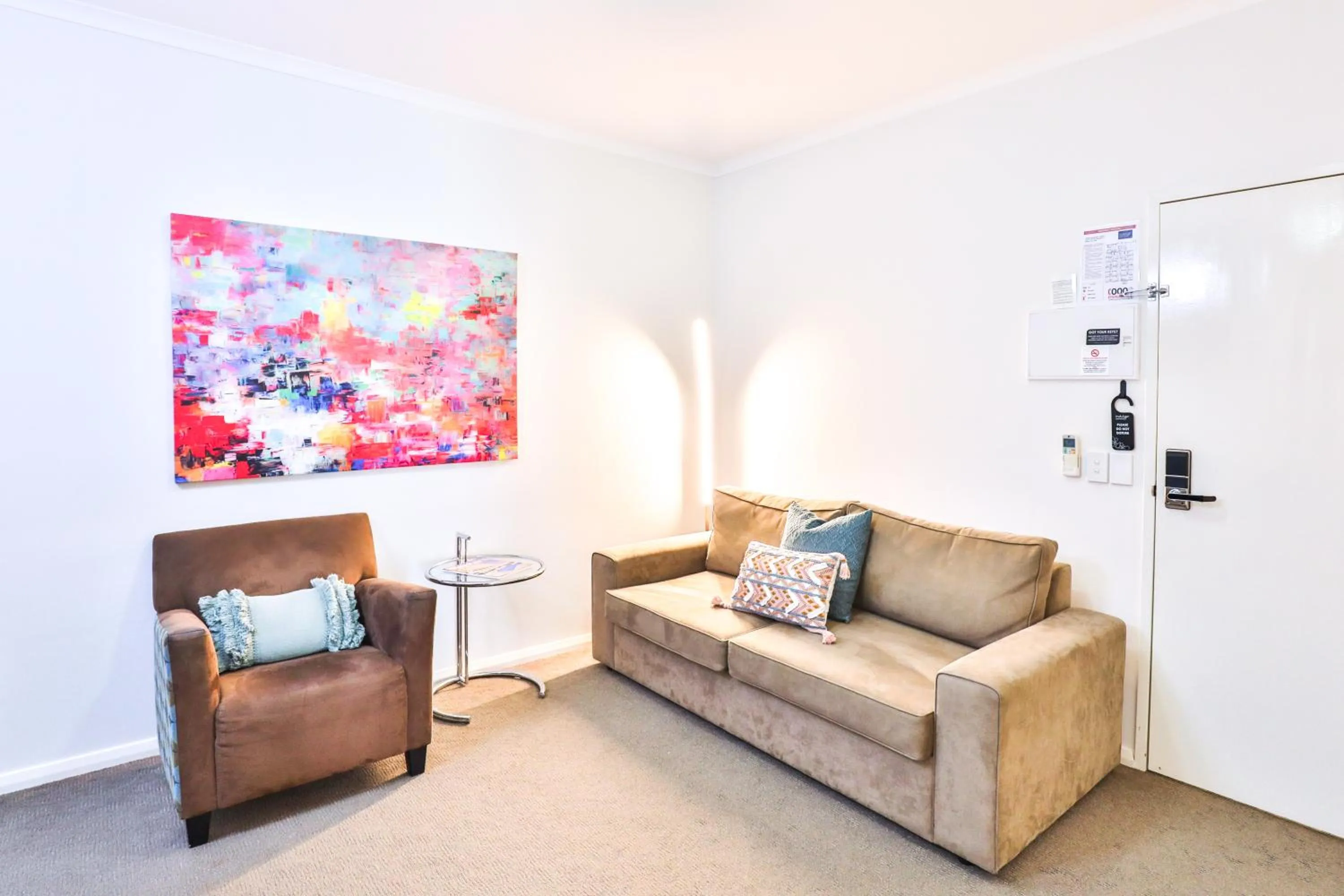 Seating area in Indulge Apartments - Ontario