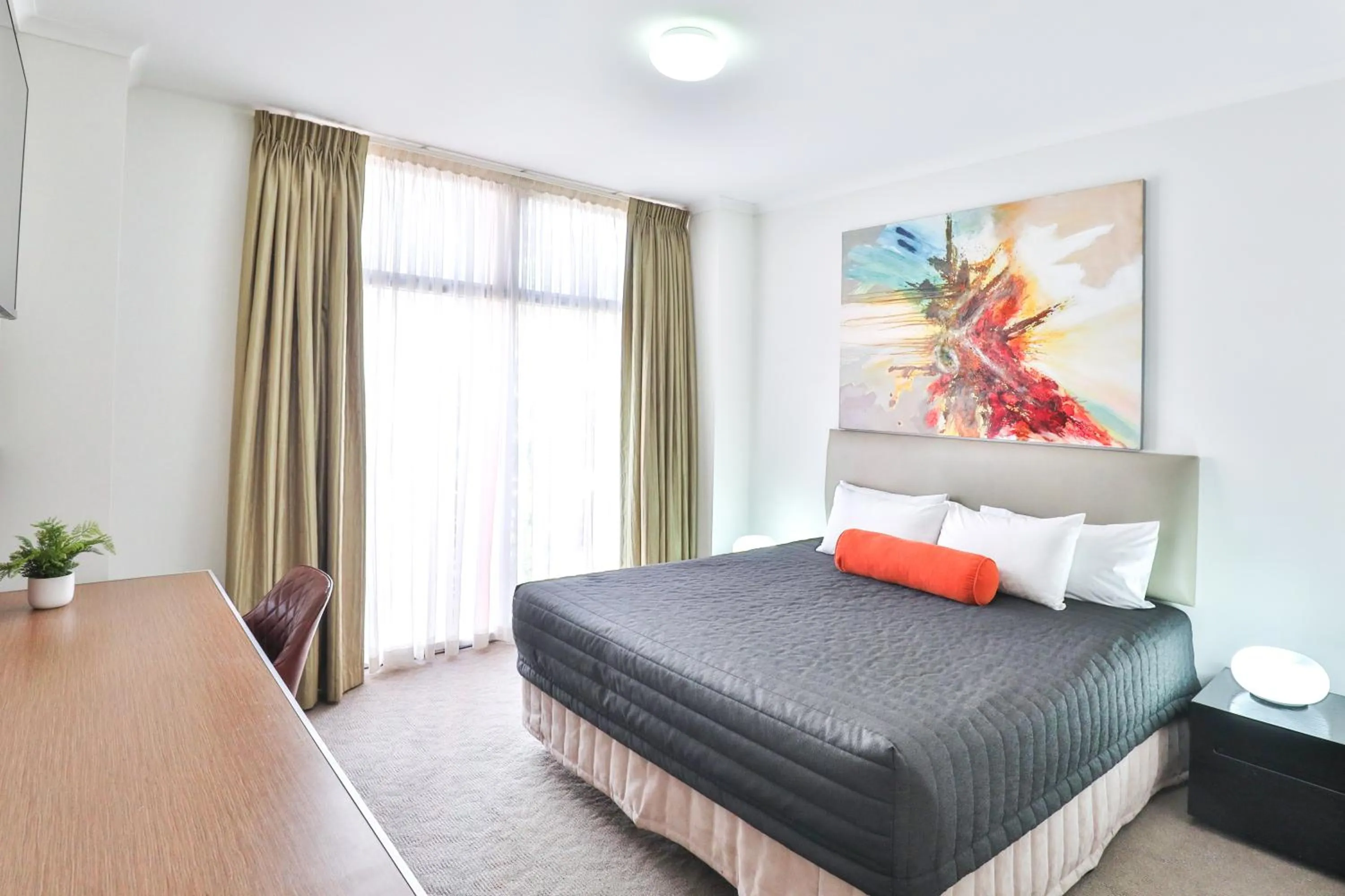 Bedroom, Bed in Indulge Apartments - Ontario