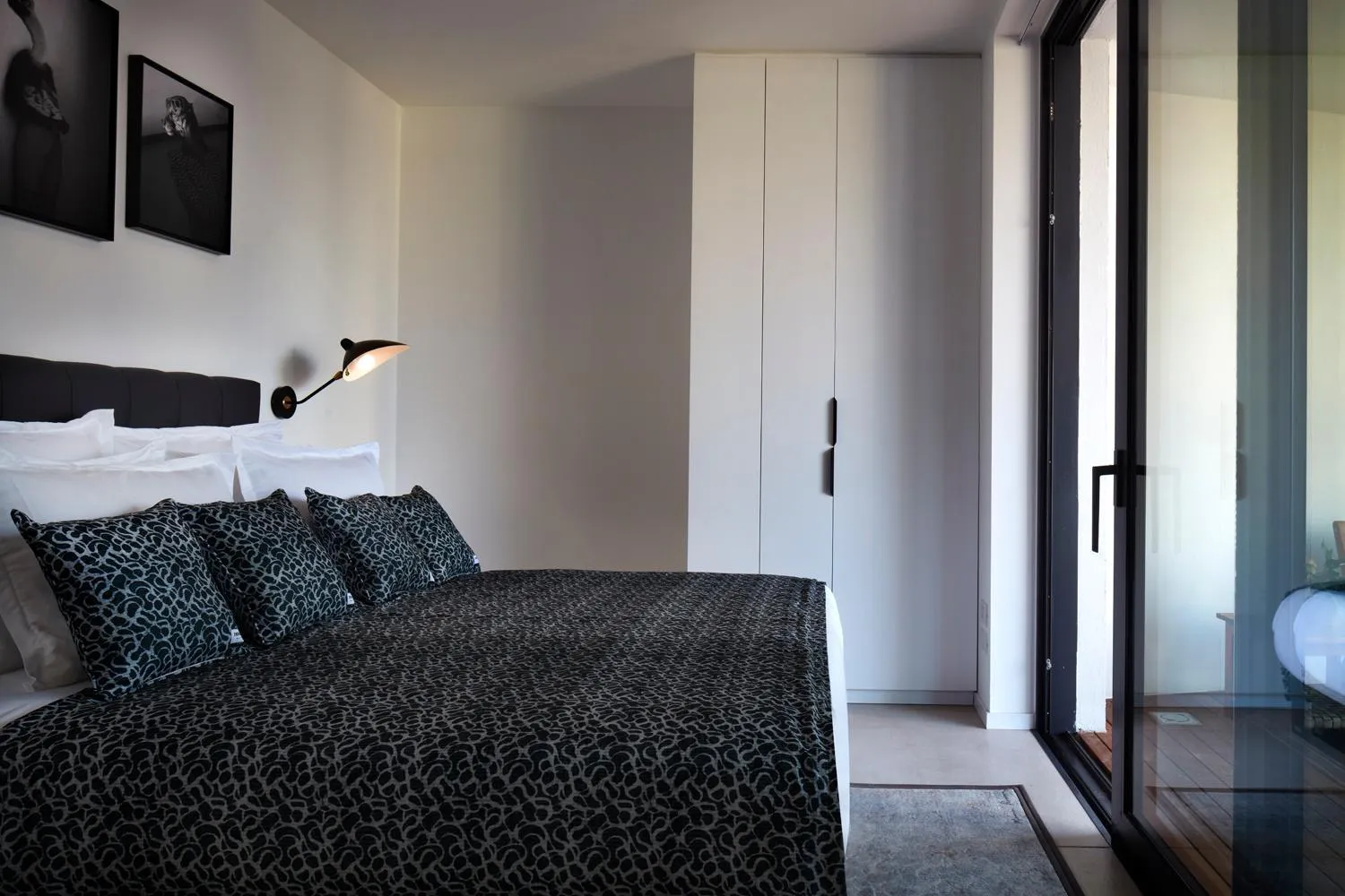 Bedroom in Renoma Apartments