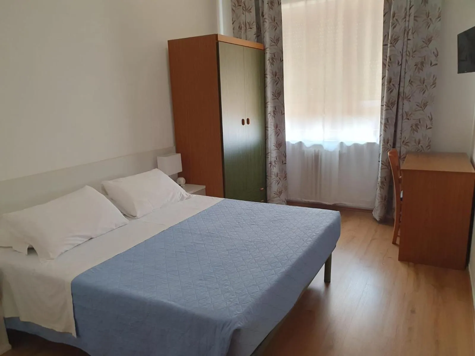 Bed in Hotel Cormorano