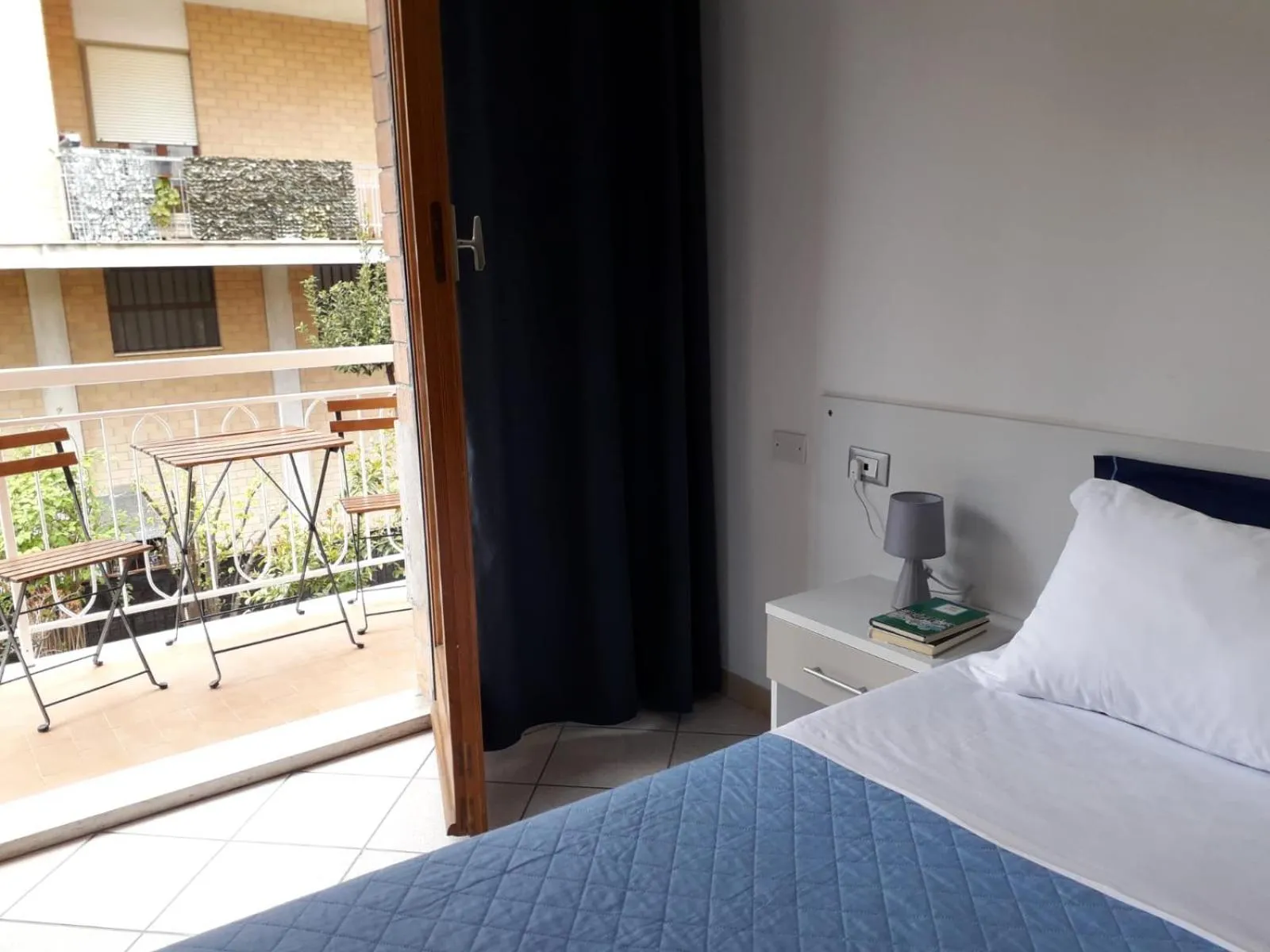 Bed in Hotel Cormorano