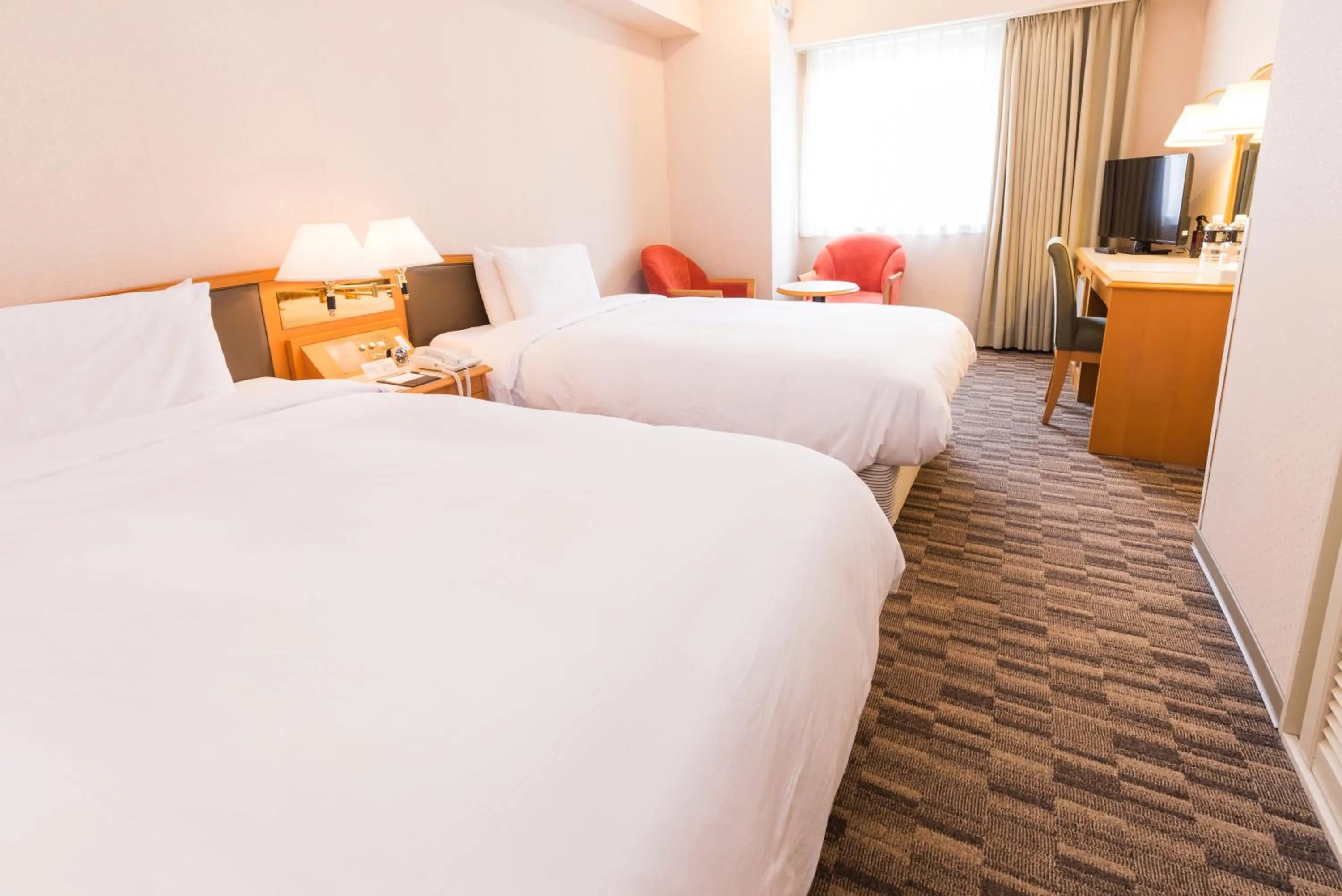 Bed in Hotel Sunroute Taipei