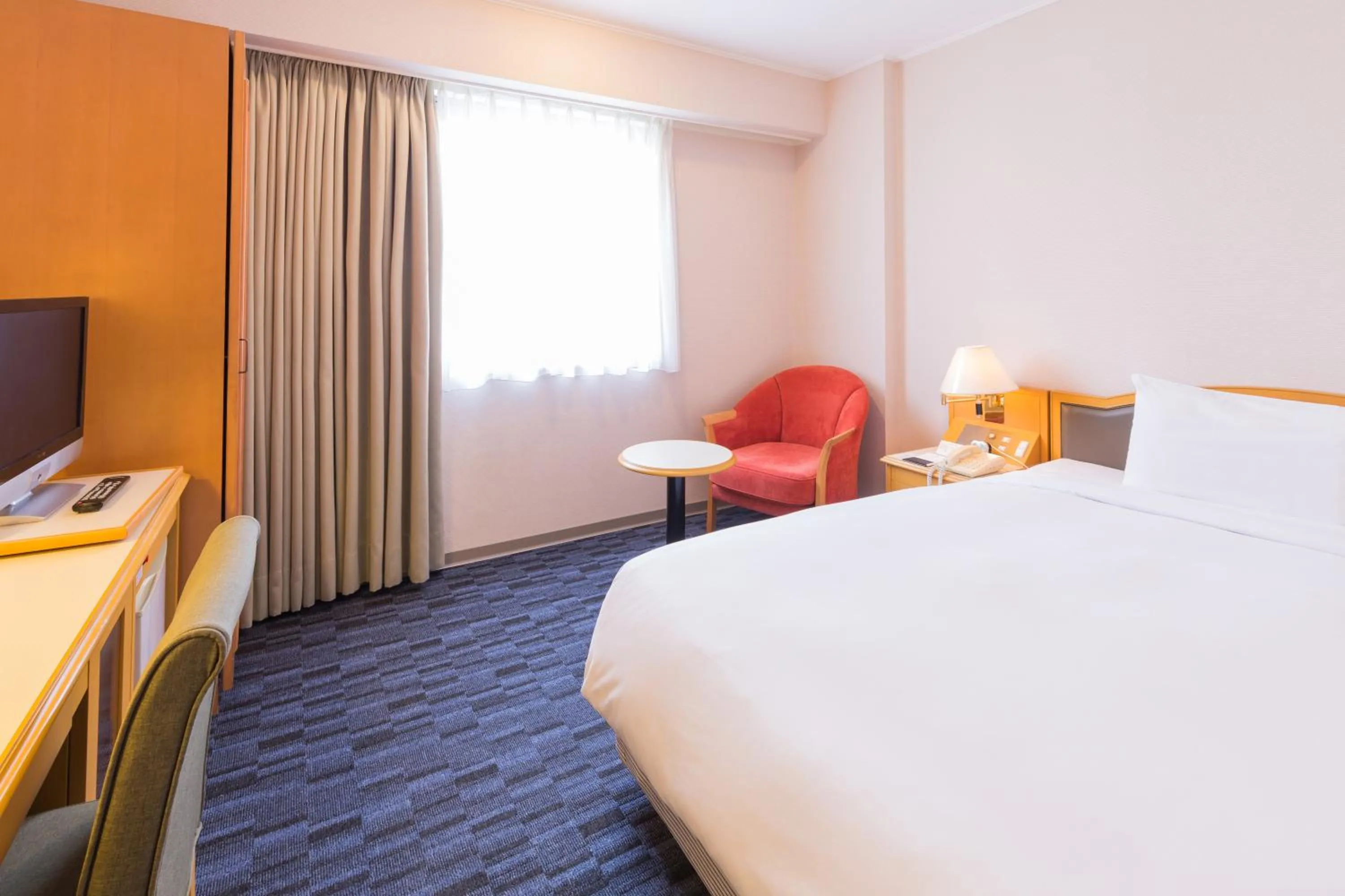 Bed in Hotel Sunroute Taipei