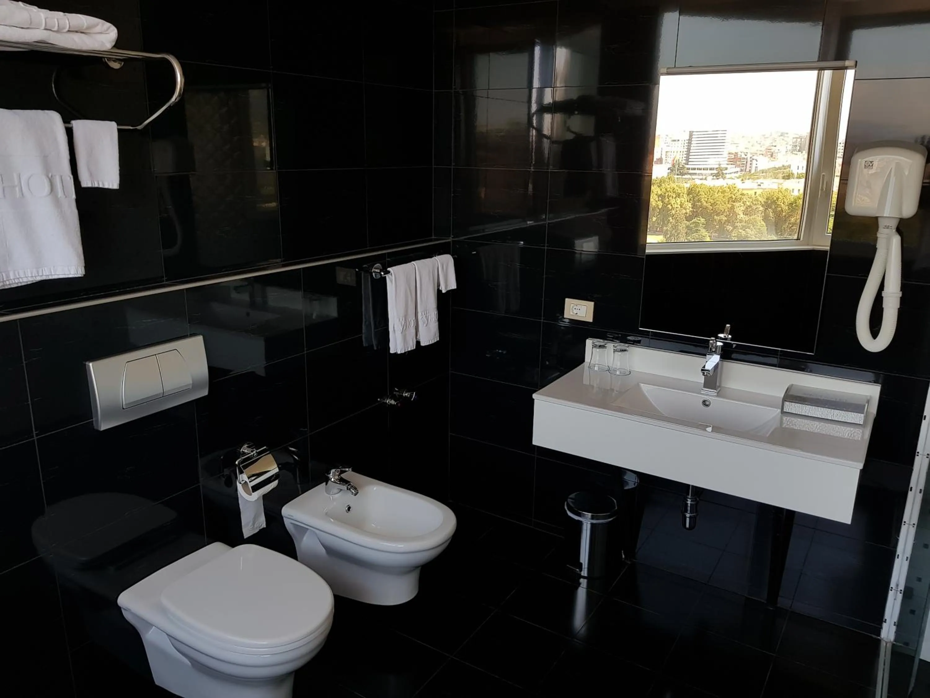 Toilet in Sky Hotel Tirana