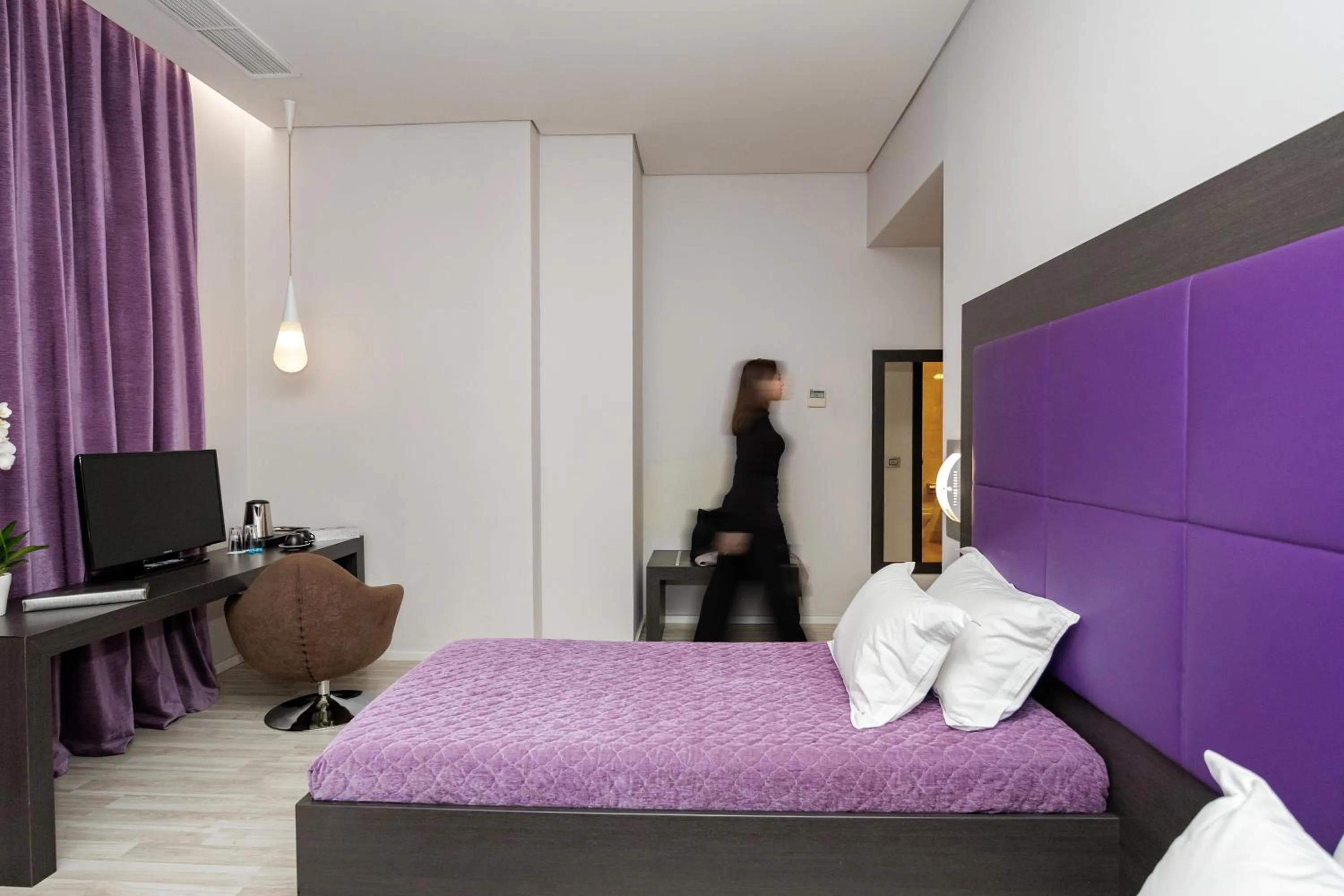 Communal lounge/ TV room, Bed in Sky Hotel Tirana