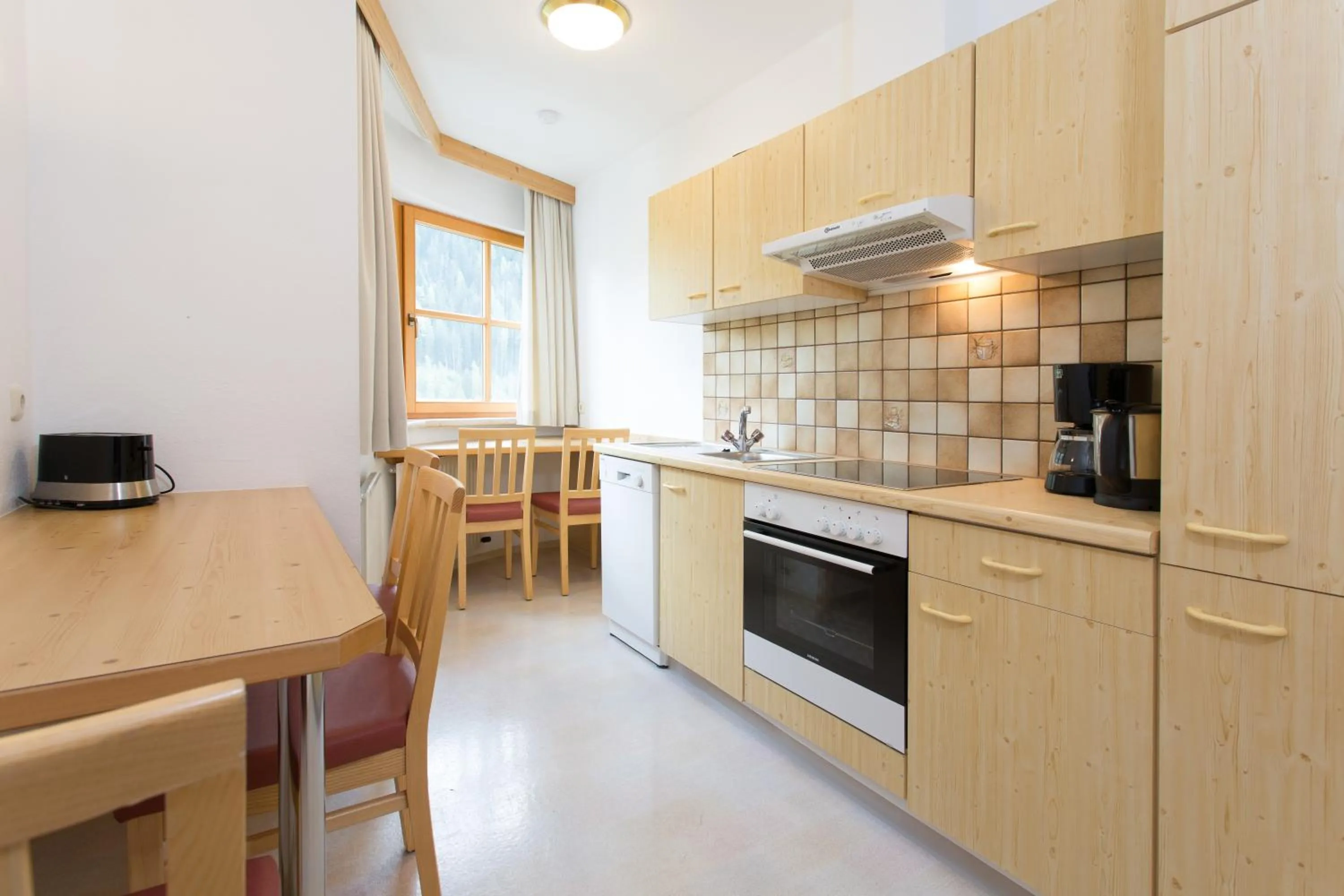 Kitchen or kitchenette in Aparthotel Alpin Life