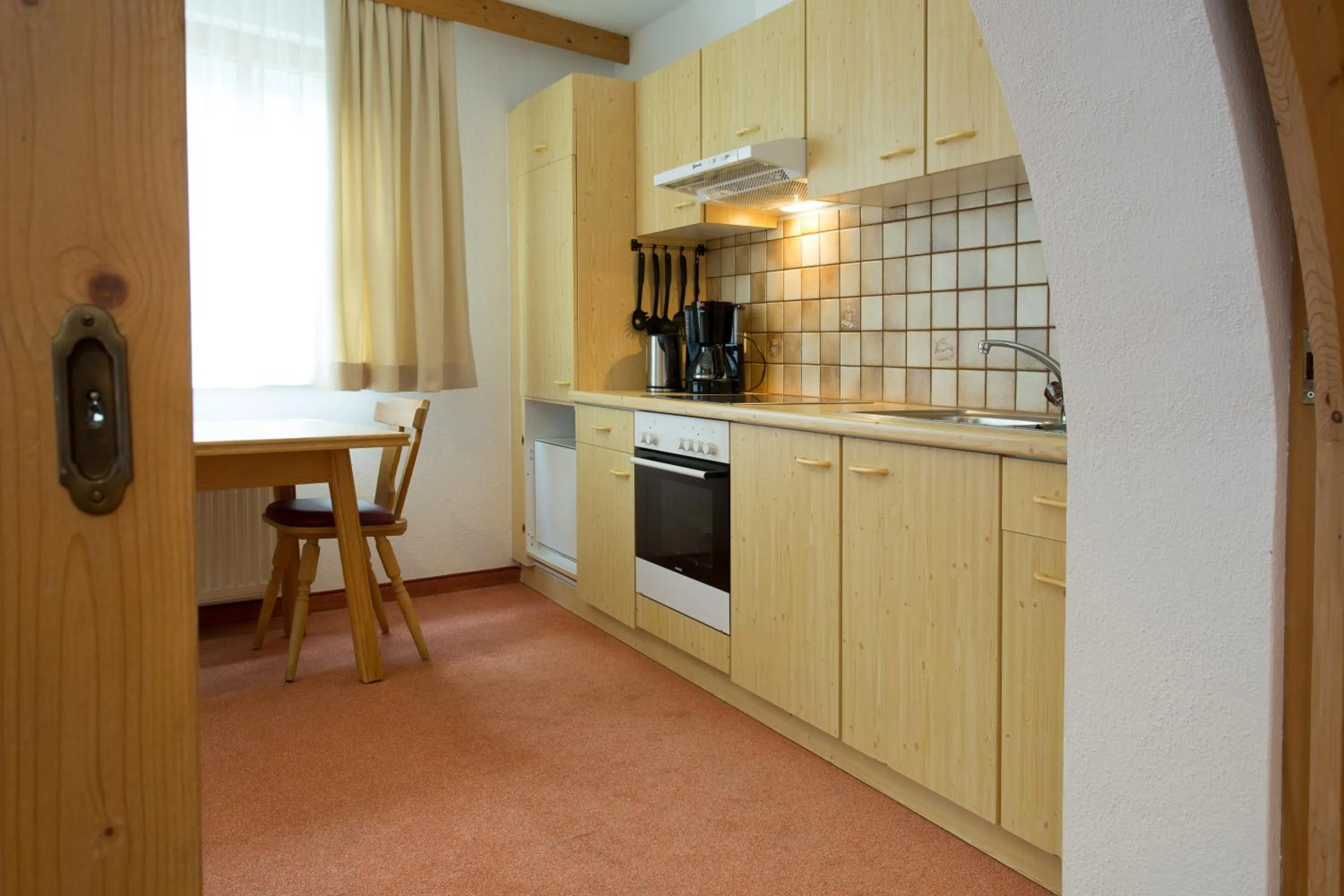 Kitchen or kitchenette in Aparthotel Alpin Life