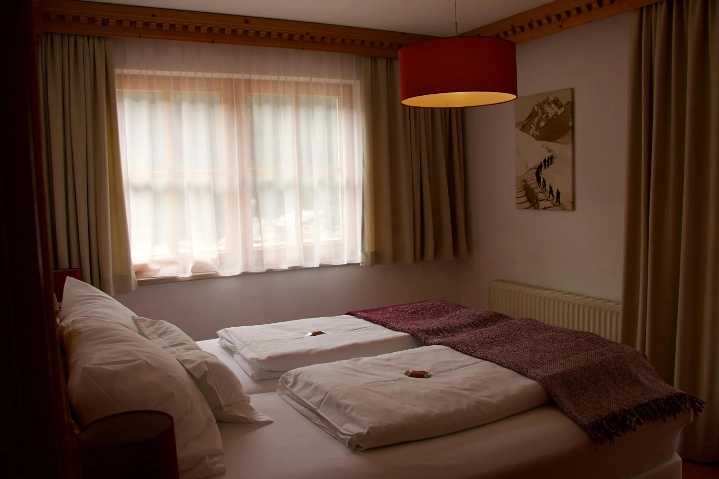 Bed in Aparthotel Alpin Life