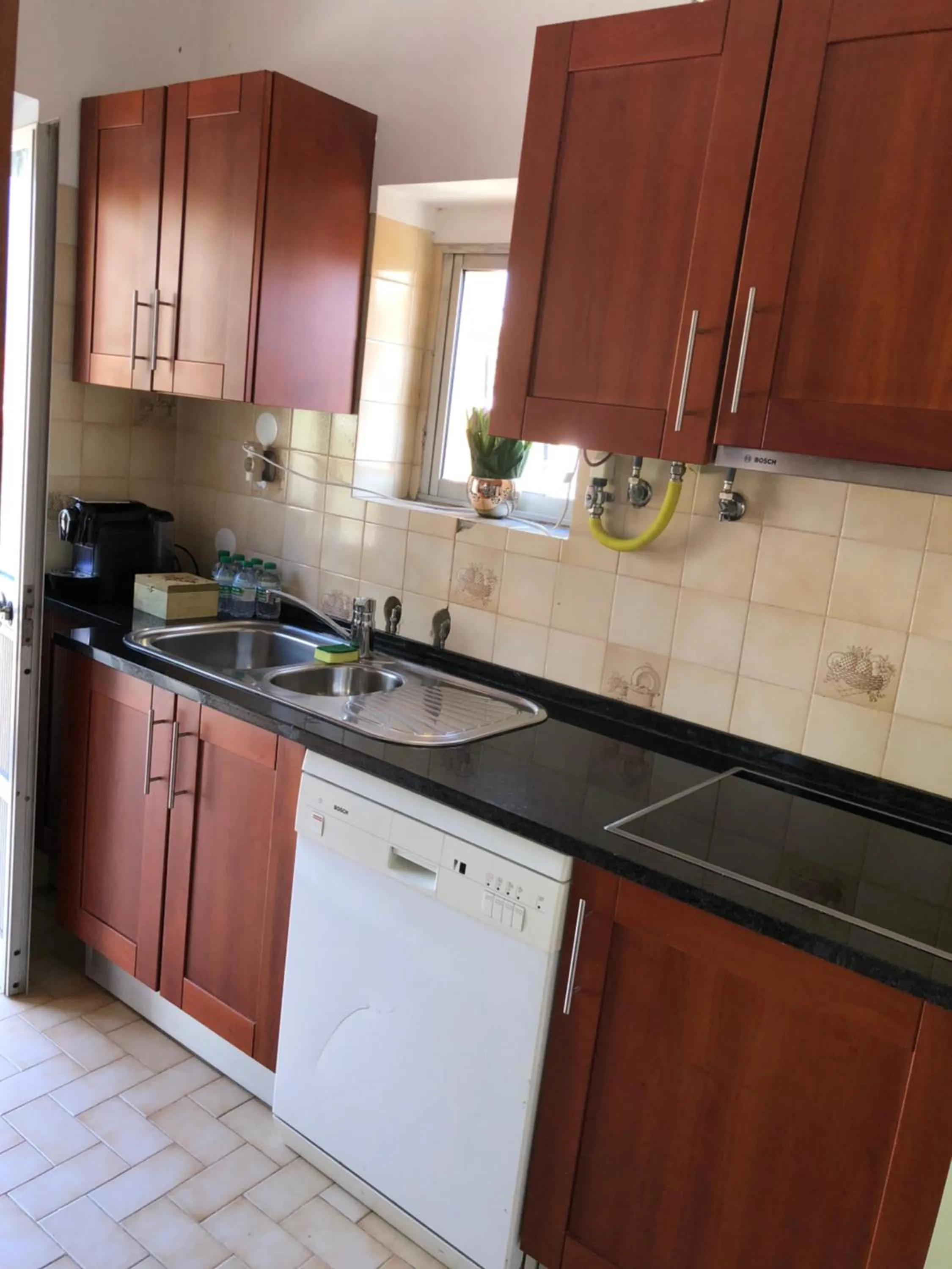 Kitchen or kitchenette in Margarida Guest House - Rooms