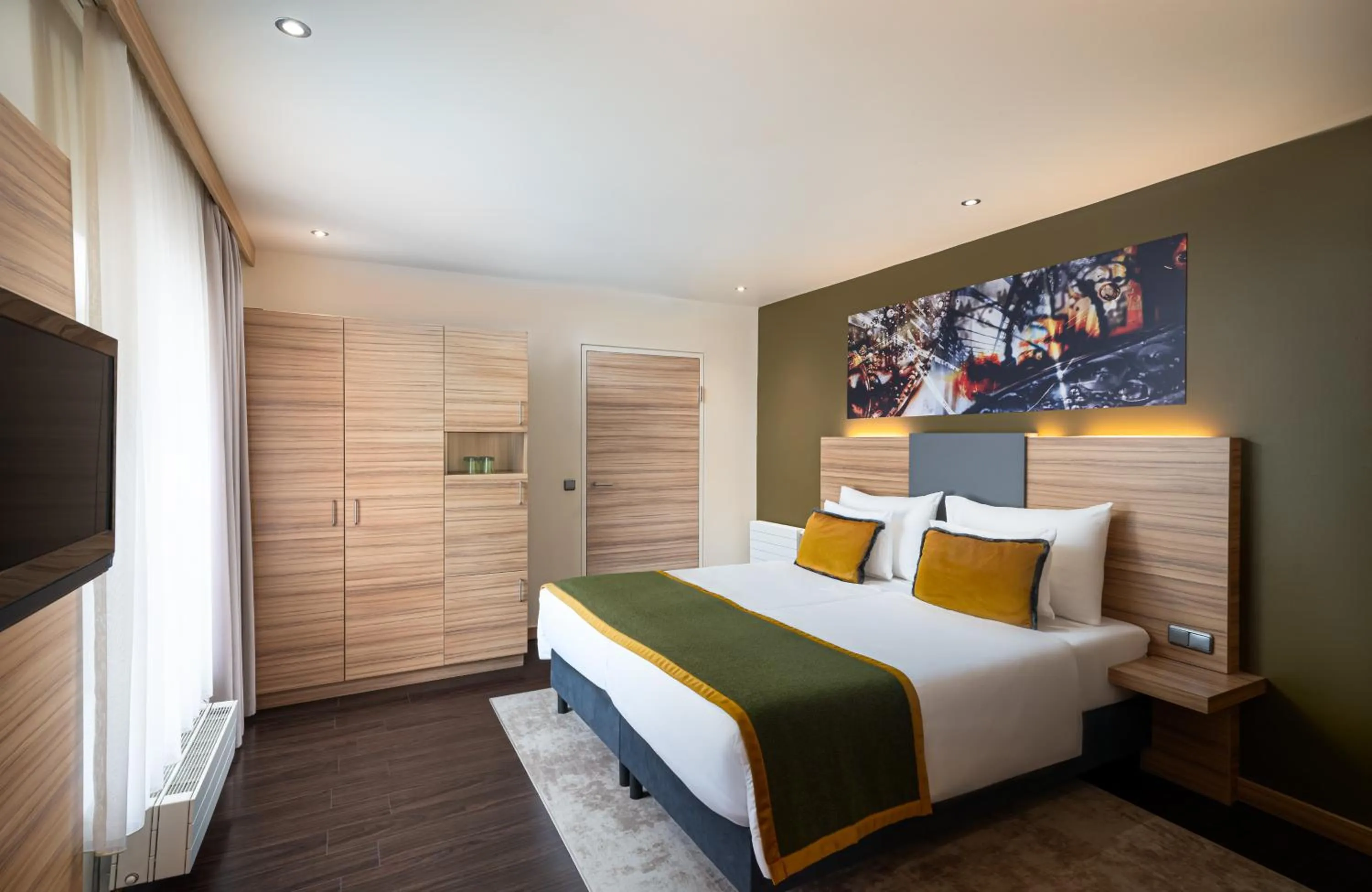 Bed in Leonardo Boutique Hotel Salzburg Gablerbräu