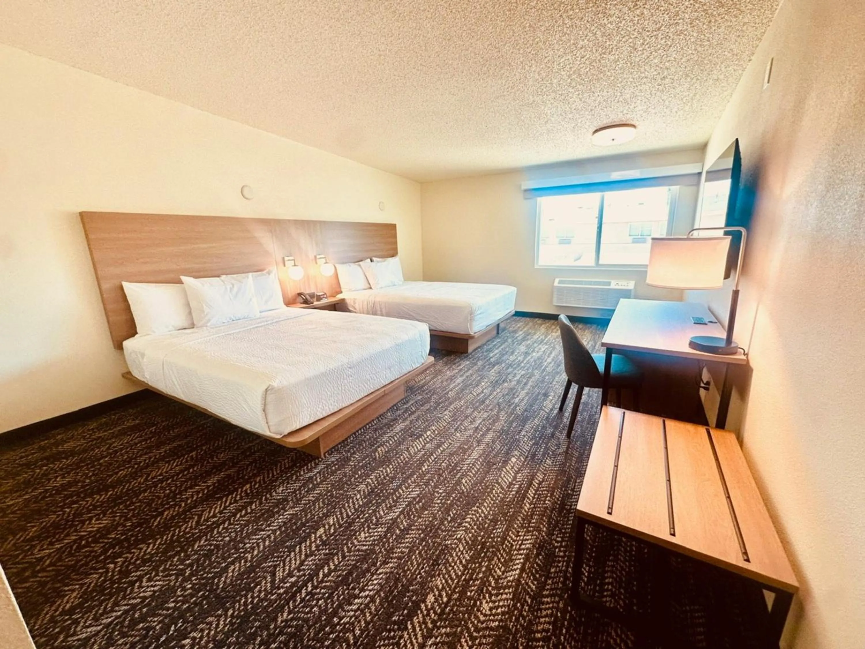 Bed in Ramada by Wyndham Merced