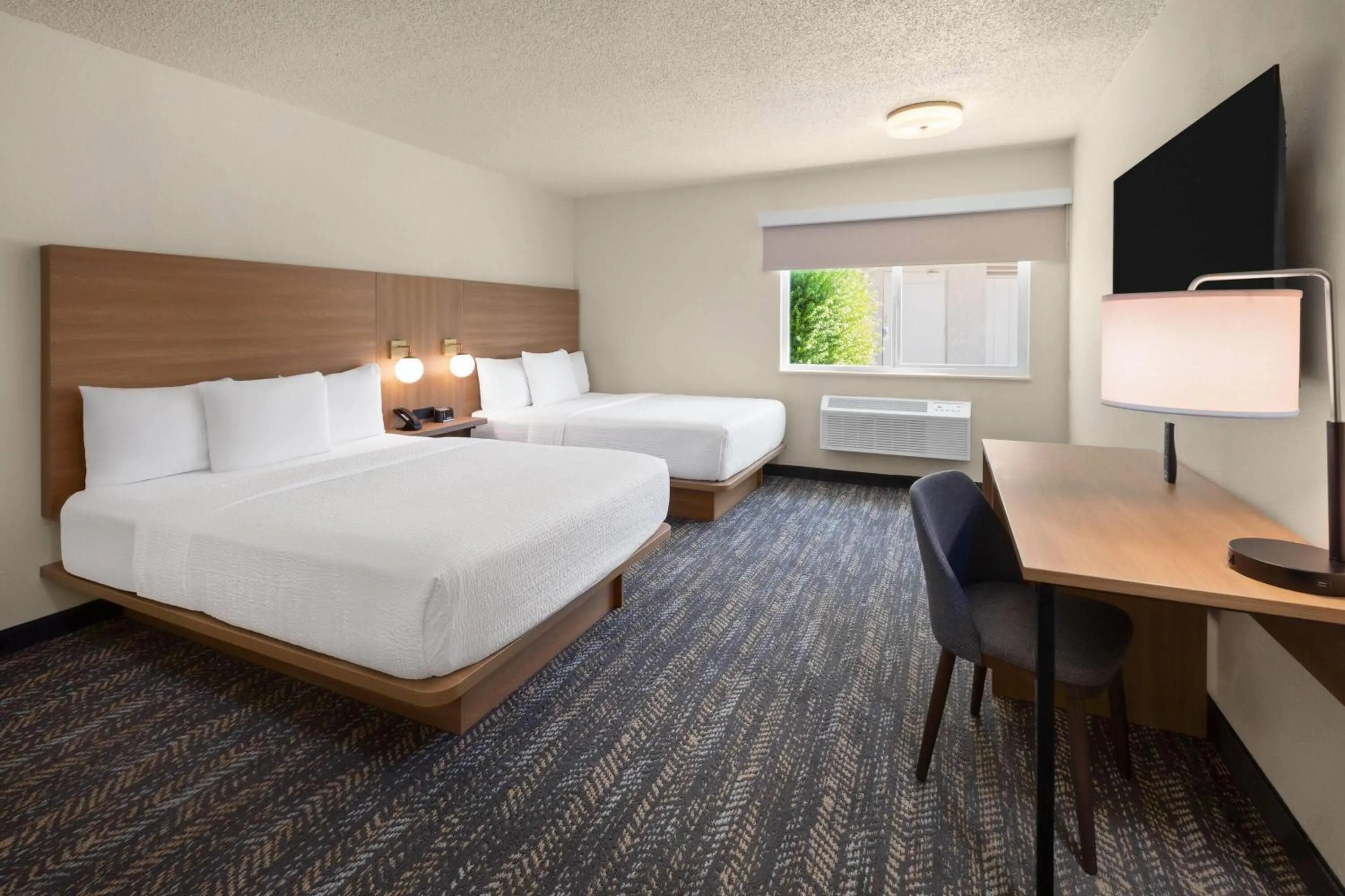 Photo of the whole room, Bed in Ramada by Wyndham Merced
