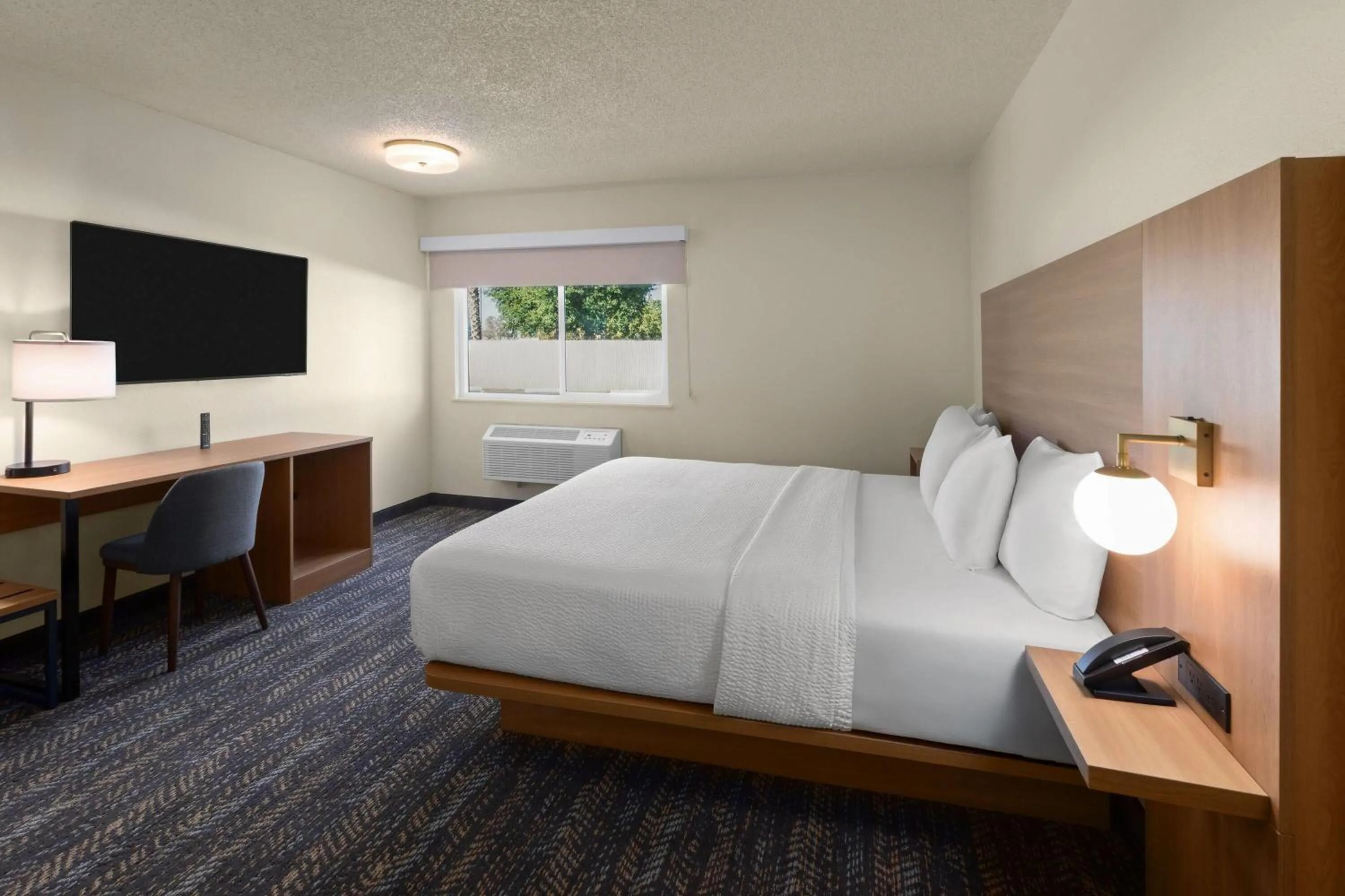 Photo of the whole room, Bed in Ramada by Wyndham Merced